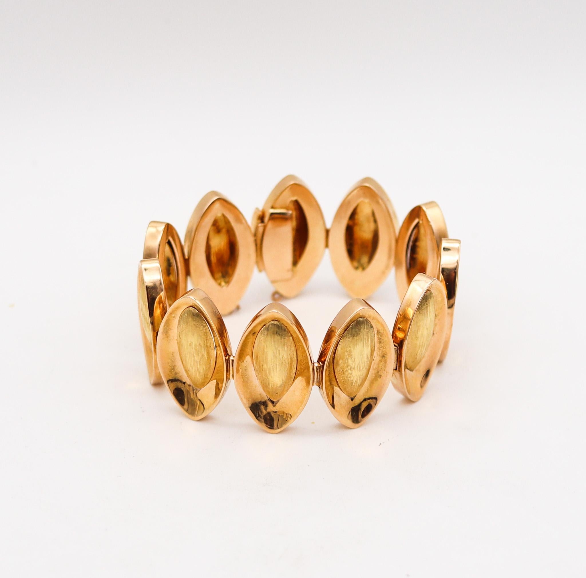 Post-war geometric bracelet made in Verona.

Fabulous mid-century bold bracelet, created in Verona Italy during the post-war period, back in the 1950. This statement bracelet has been crafted in solid yellow gold of 18 karats with polished finish