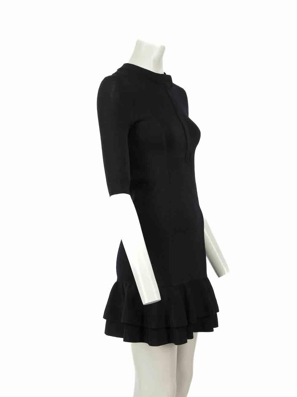 CONDITION is Very good. Hardly any visible wear to dress is evident on this used Veronica Beard designer resale item.
 
Details
Black
Viscose
Mini dress
Round neckline
Stretchy and bodycon
Front zip up closure with snap buttons
Tiered skirt
 
Made