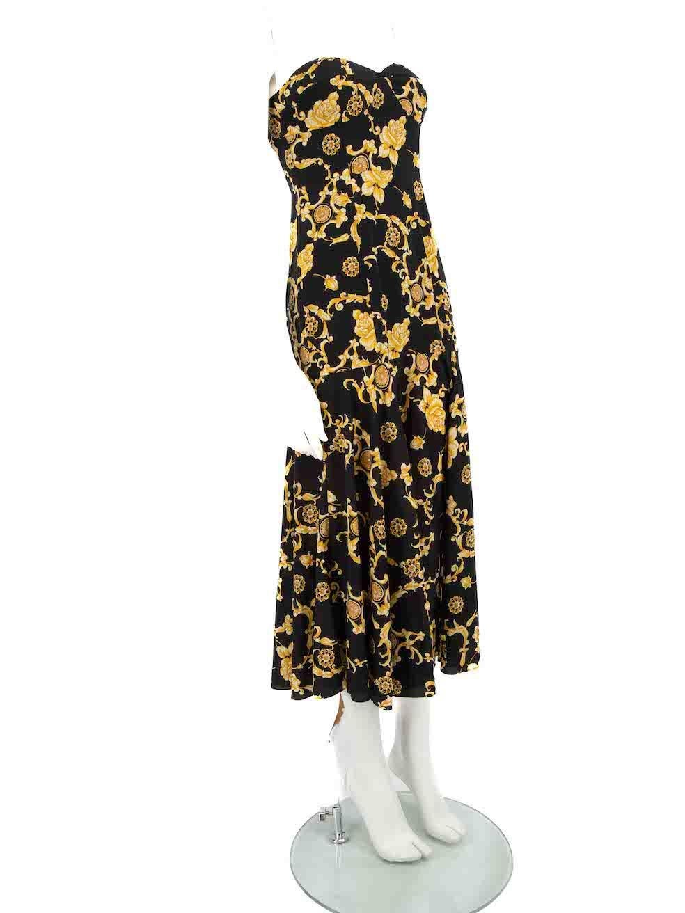 CONDITION is Very good. Hardly any visible wear to dress is evident on this used Veronica Beard designer resale item.
 
 
 
 Details
 
 
 Black and yellow
 
 Silk
 
 Dress
 
 Floral print
 
 Midi
 
 Strapless
 
 Back zip fastening
 
 
 
 
 
 Made in