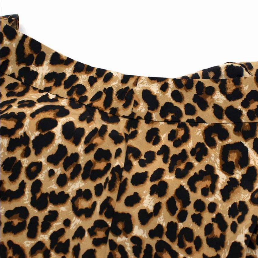 Veronica Beard Leopard Print Silk Crepe Handkerchief Skirt

- Lightweight and unlined
- side zip closure
- handkerchief hem
- SAMPLE PIECE
- Fall 2019

Please note, these items are pre-owned and may show some signs of storage, even when unworn and