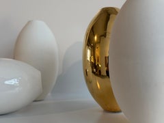 Wall sculpture, porcelain eggs, glazed and gold-plated, bright white