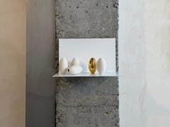 Wall sculpture, porcelain eggs, glazed and gold-plated, bright white