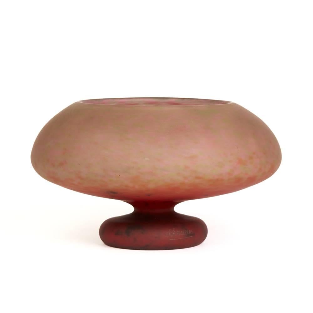 A large and rare French Art Deco red mottled art glass bowl of mushroom shape of waisted form on a hollow circular spreading base with the mottling intensifying and darkening towards the base by Schneider Glassworks (Verrerie Schneider). Designed by