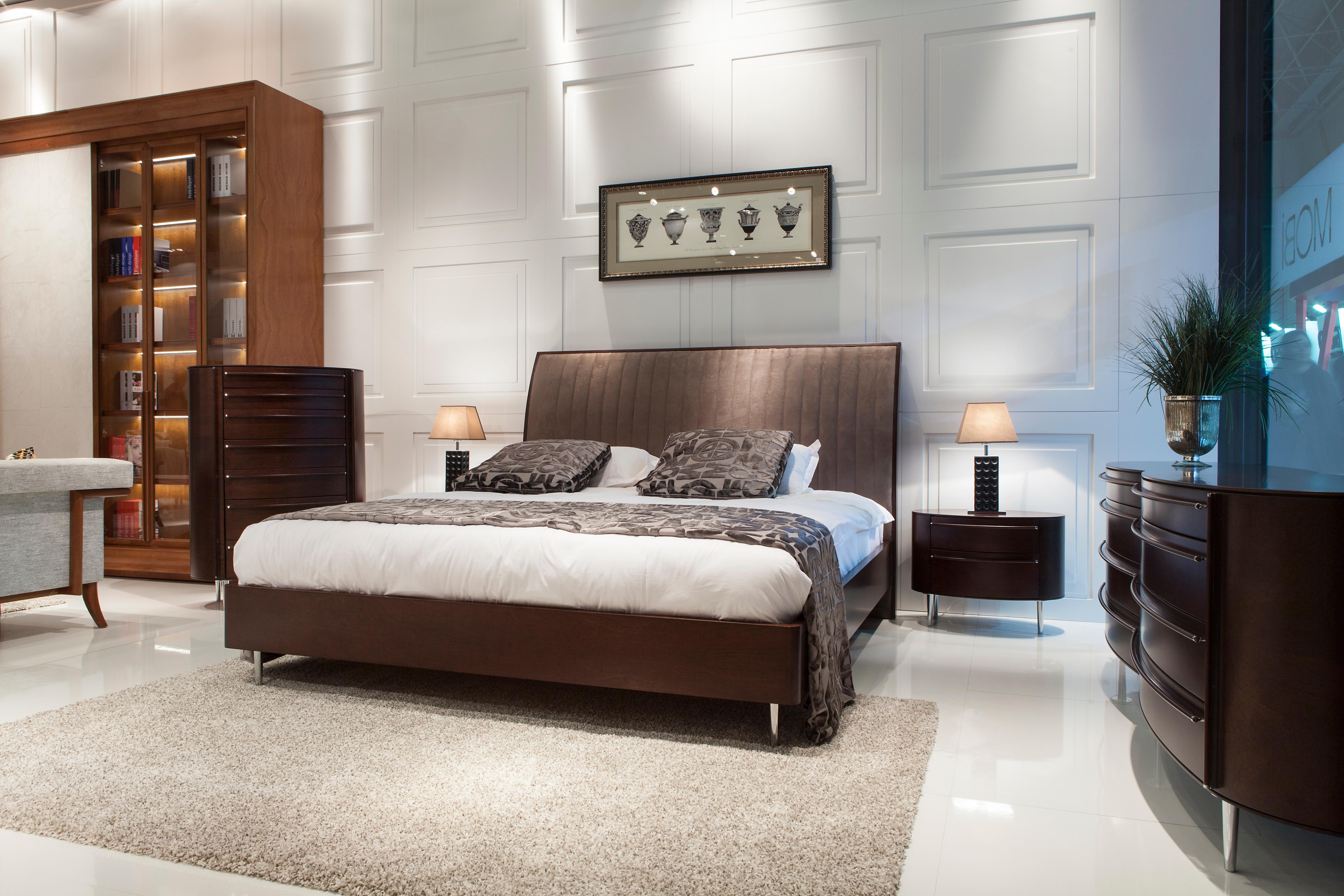 solid wood bed with upholstered headboard