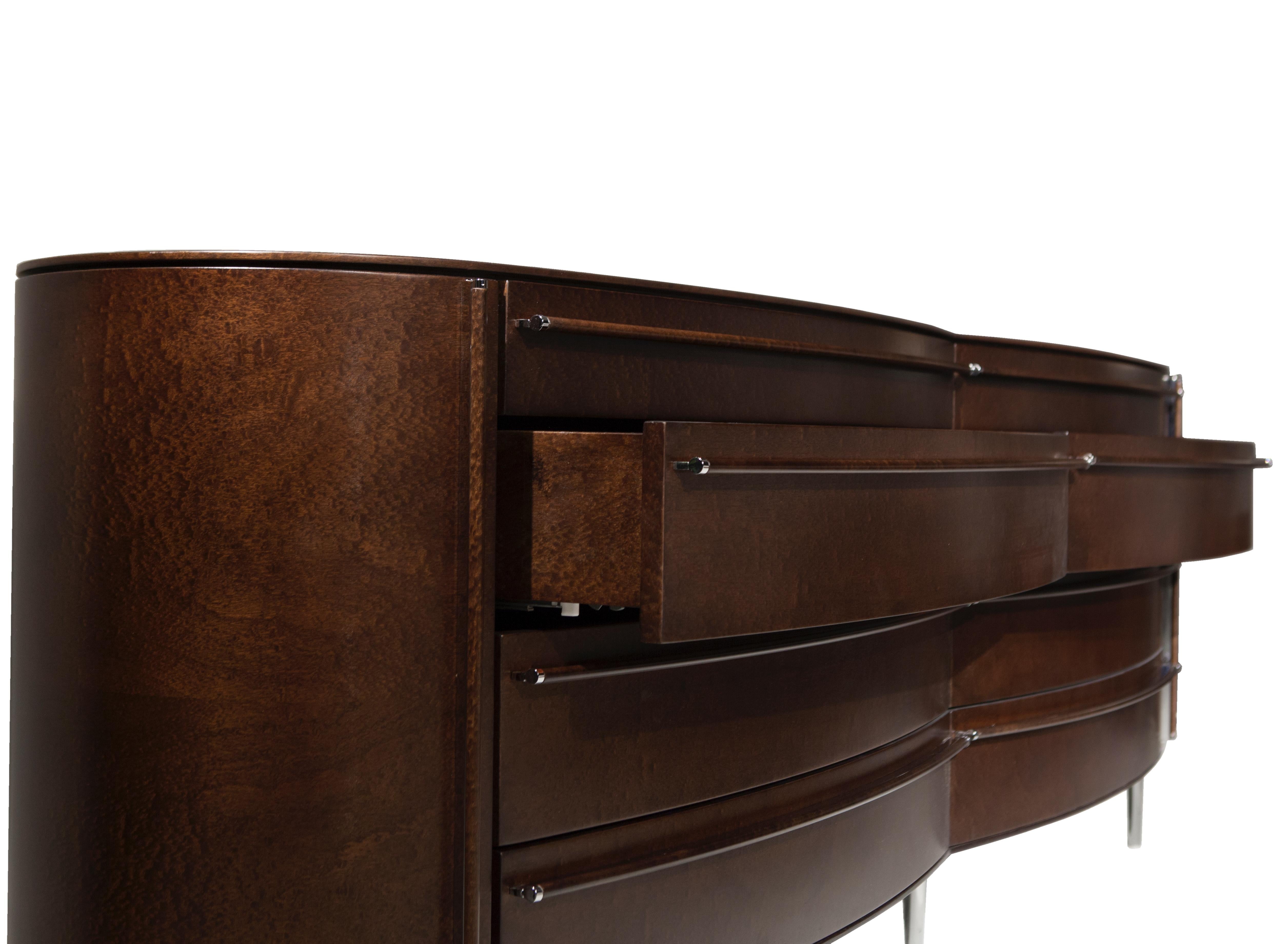 The Versa dresser’s slim and curved profile with 6 drawers is a timeless design atop sleek metal legs.