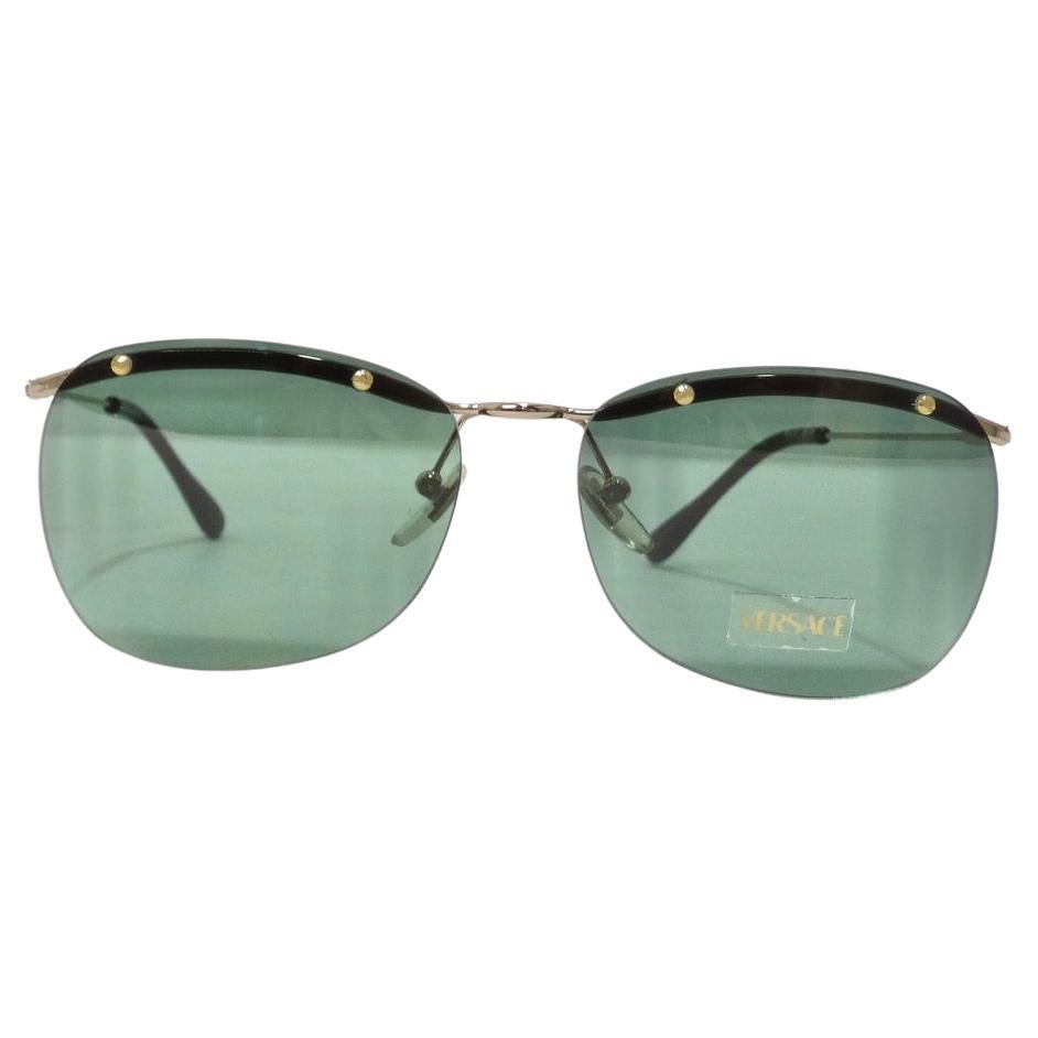 Versace 1990s Black/Gold Sunglasses For Sale