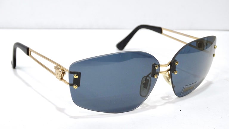 Vintage Gianni Versace at it's best! Get a piece of the iconic fashion house with these deadstock sunglasses.  Adding the right accessories to an outfit can really take it from zero to hero! Try it out with these cool and edgy sunglasses. Vintage is