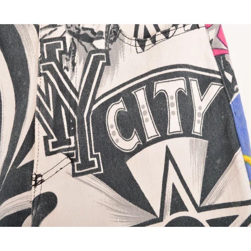 Early 1990s Versace Jeans Couture stretchy denim jeans. 

Featuring monochrome New York City print on the front, with contrasting, loud colourful New York City printed pattern on the reverse. 

Features:
Zip fasten
Classic x4 pocket design
Versace