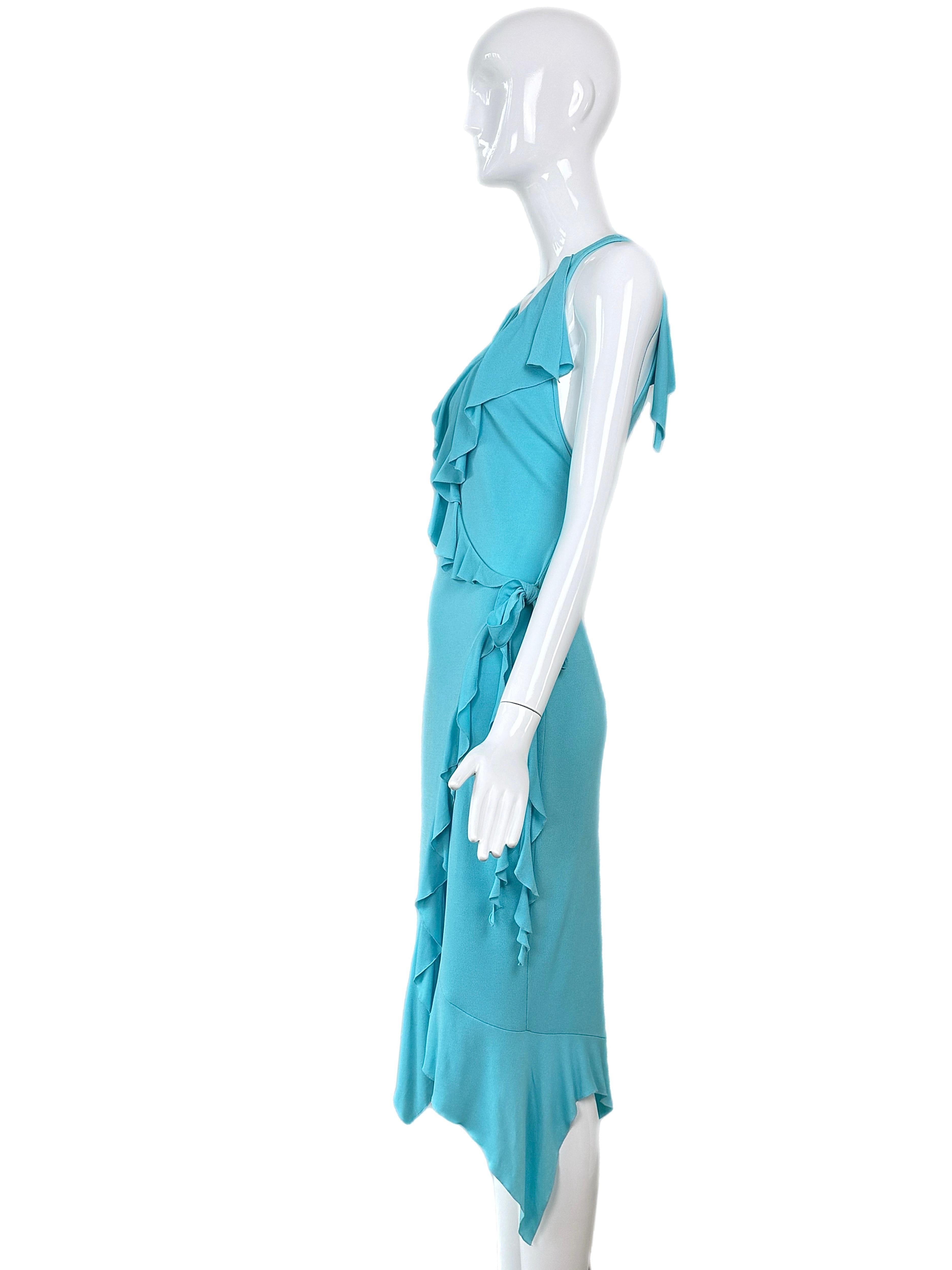 Versace
SS04
Vintage
Runway style
Aqua Blue
Ruffle wrap dress
IT42 but can fit many sizes
Good vintage condition. One tonal stain on the front ruffle and one stain near the undone seam at the hem.
Still looks like a banger on, and these do not take