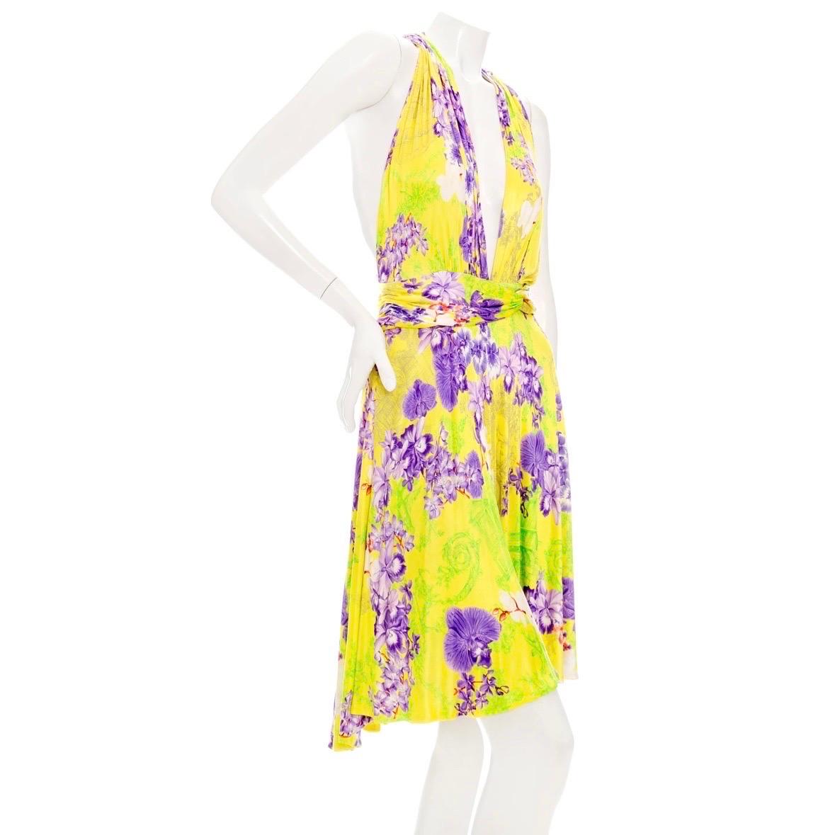 Versace 2004 Yellow Slinky Floral-Print Halter Dress
Spring 2004 Ready-To-Wear
Yellow/Purple
Floral print on French-inspired background print
Sleeveless
Deep V-neckline
Halter strap
Infinity loop belt front detail
Invisible back zip closure