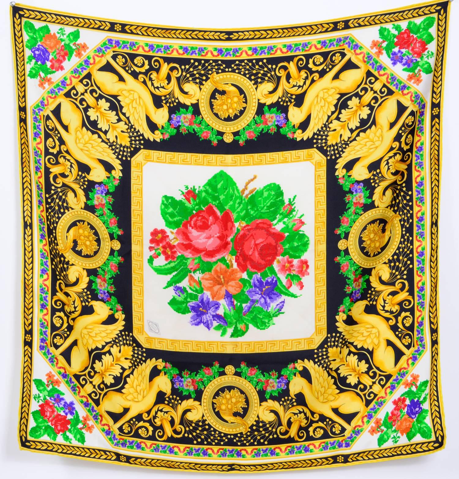 Beautiful scarf by Versace Atelier - Hand rolled edges - 100% silk - Signed Versace Atelier - Baroque Print Frame - Needlepoint embroidery flower print 
Measurements:  35inch/89cm -by 35inch/89cm
Excellent condition