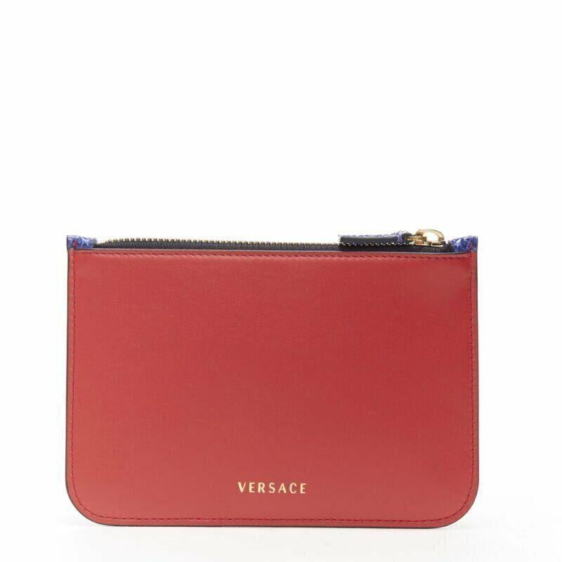 VERSACE Ayers scaled leather gold Medusa stud bordered top zip pouch case
Reference: TGAS/A04058
Brand: Versace
Designer: Donatella Versace
Material: Leather, Leather
Color: Blue, Red
Pattern: Solid
Closure: Zip
Lining: Fabric
Estimated Retail