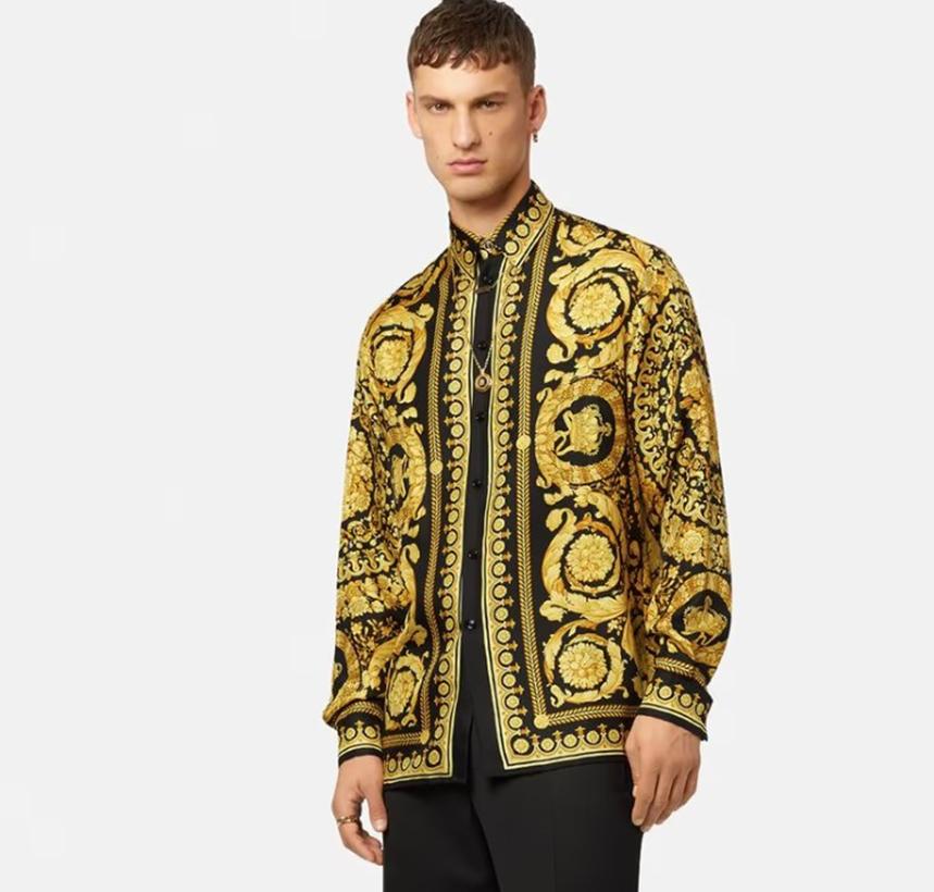 VERSACE SHIRT

This silk shirt features a branded print and a point collar.
Pointed collar
Button-front closure
Long sleeves

Content: 100% silk

Made in Italy

Brand new, display model. Comes with Versace hanger and Versace garment bag

 100%