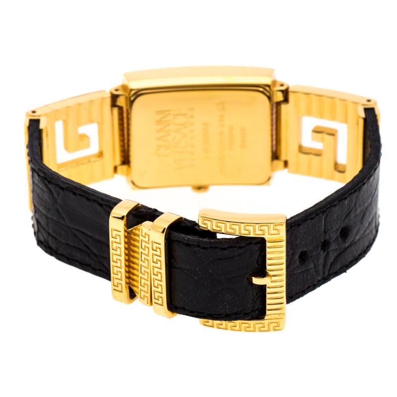 Versace offers designs portraying grand style with everything eye-catching and this creation from the label demonstrates just that. The watch is made of 18k yellow gold plated stainless steel and held by black leather straps. It is graced with a