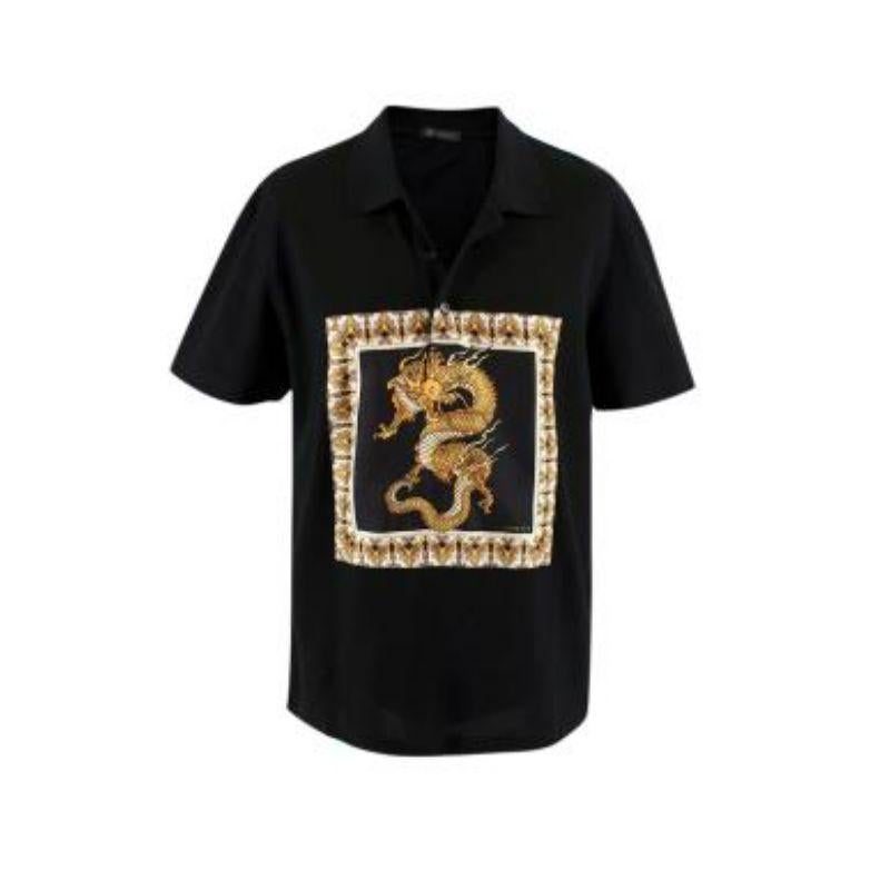 Versace Black and Gold Dragon-print Shirt

- Short sleeved
- Button-up fastening
- Gold dragon print embroidery
- Collared

Material
100% Cotton
Print fabric: 100% Silk

Made in Italy

PLEASE NOTE, THESE ITEMS ARE PRE-OWNED AND MAY SHOW SIGNS OF