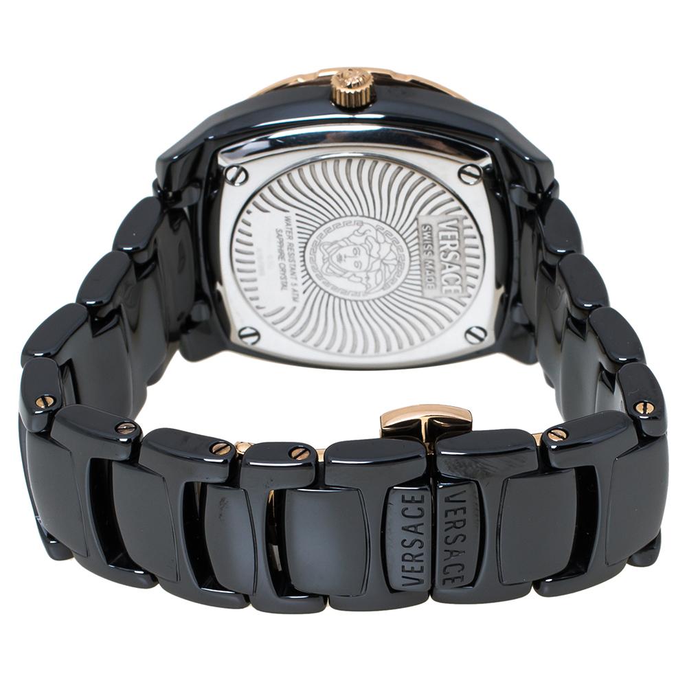 The Versace DV One Glamour 63Q timepiece is a delight for watch lovers. Functioning in quartz movement, the watch has a black ceramic and rose gold plated stainless steel case with a diameter of 34 mm. While the bezel is adorned with shimmering