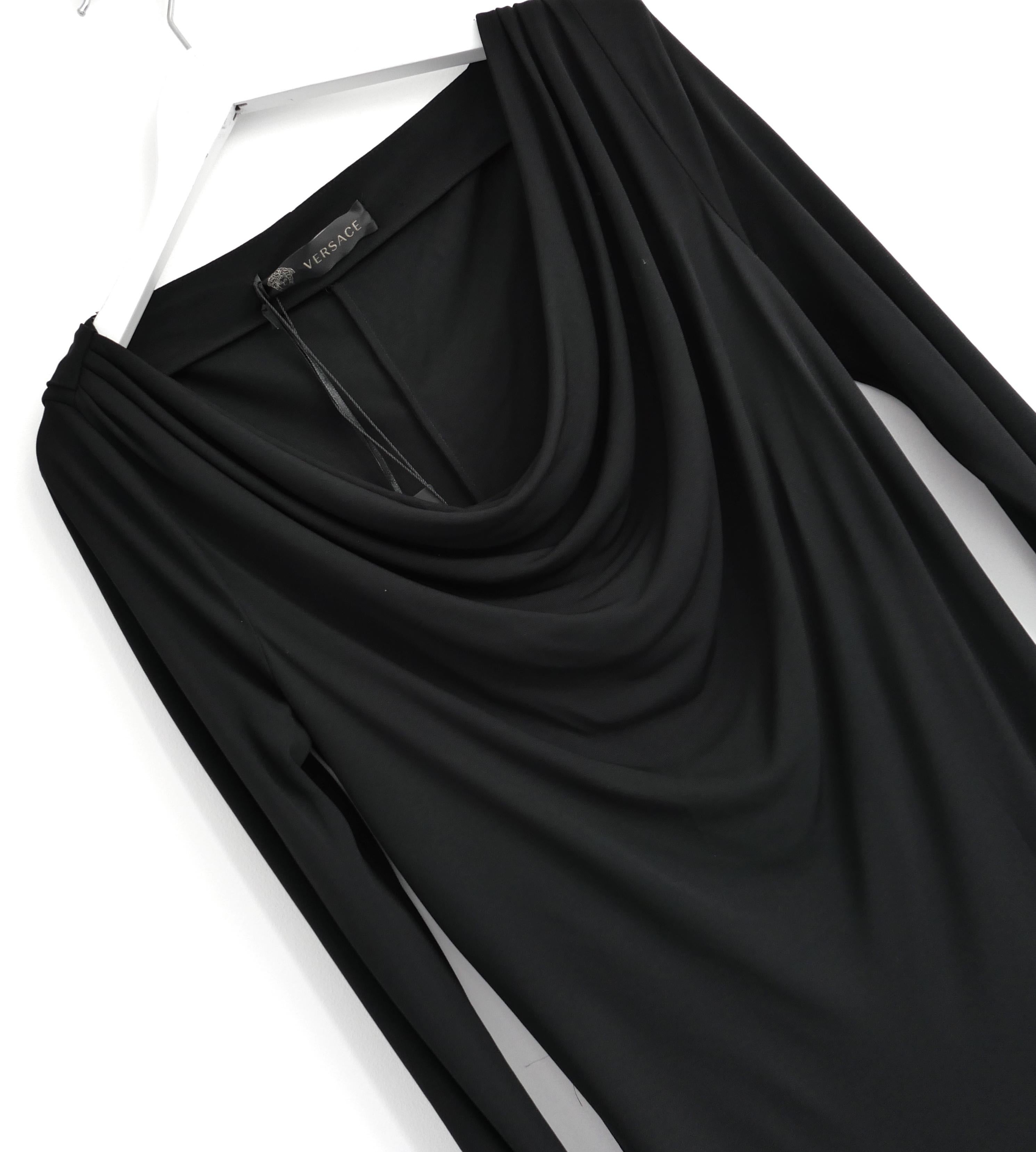 Stunningly slinky Versace black silk double slip dress. Bought for £1475 and unworn. Made from glossy black silk with silk chiffon inner slip, it has asymmetric draped neckline, darted detailing and fared hem.  Size IT40/UK8. Measures approx - bust