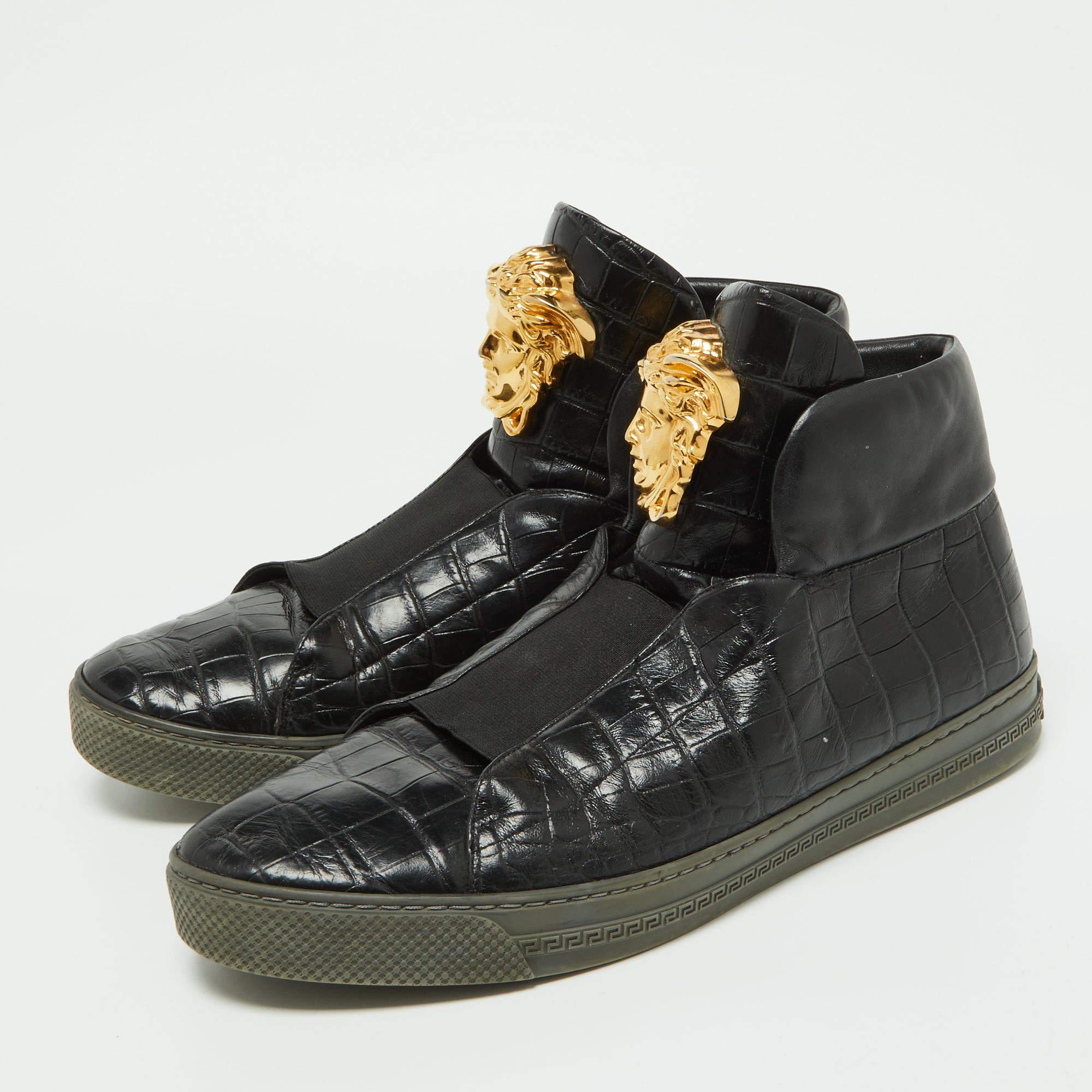 Brimming with fabulous details, these Versace sneakers are crafted from croc-embossed leather into a high-top silhouette and feature the Medusa logo. The fine construction and trendy appeal make these sneakers a must-buy.

