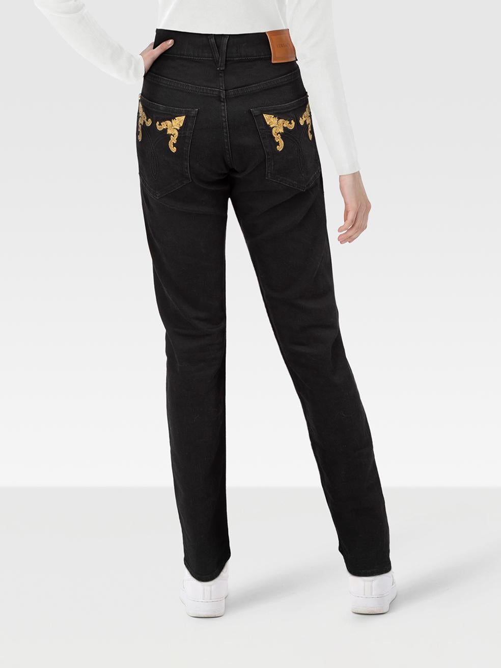 CONDITION is Very good. Minimal wear to the jeans is evident. Discolouration on the front and back of both trouser legs on this used Versace designer resale item. Discolouration may need gentle hand wash contrary to dry clean instructions. Please
