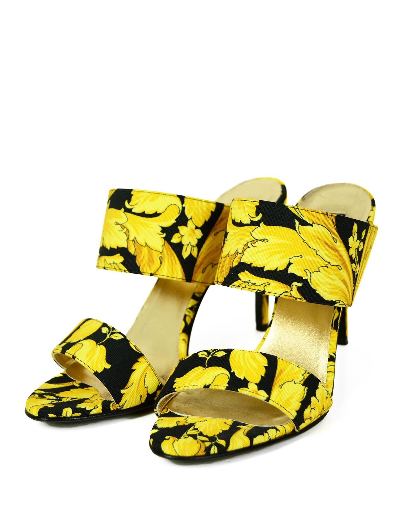 Versace Black/Gold Grosgrain Barocco Print Heeled Sandals sz 39.5

Made In: Italy
Year of Production: 2020
Color: Black and gold
Materials: Grosgrain
Closure/Opening: Slip on
Overall Condition: Excellent pre-owned condition.  Light wear to