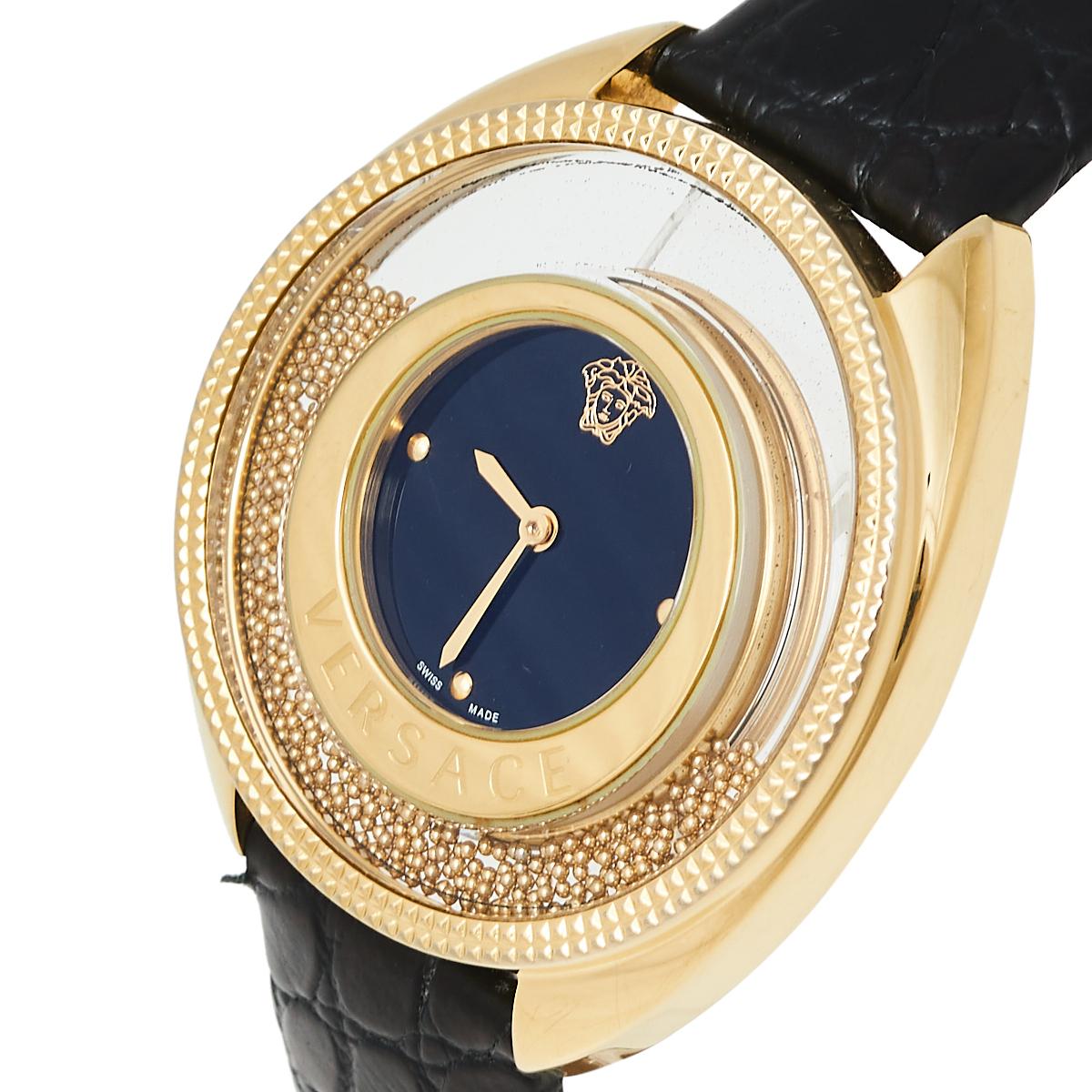 This beautiful timepiece from the house of Versace is sure to be a conversation starter with its eclectic and eye-catching design. Constructed using gold-plated stainless steel, this Destiny Spirit watch features a transparent panel on the case