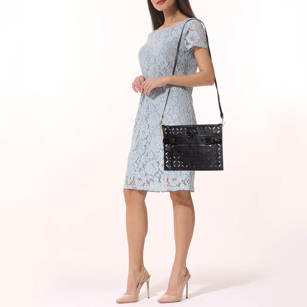 Get style and carry your essentials with ease using this designer shoulder bag. It has been crafted using high quality materials to be a standout accessory.
