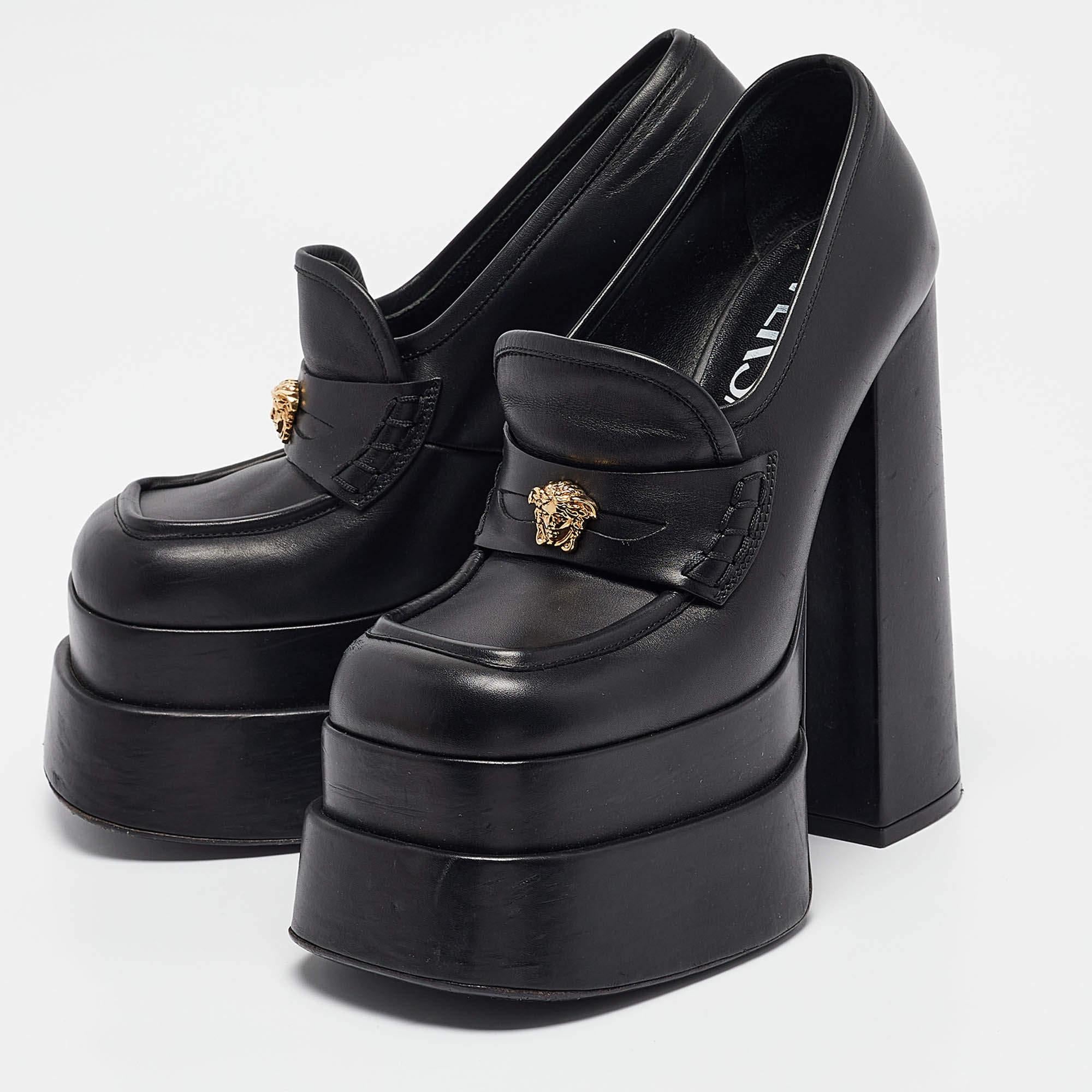 Indulge in iconic Versace glamor with these block heel pumps that make a statement from every angle. Theyre fashioned in leather and have layered platforms  15 cm heels  and the Medusa head on the uppers in shiny gold tone.