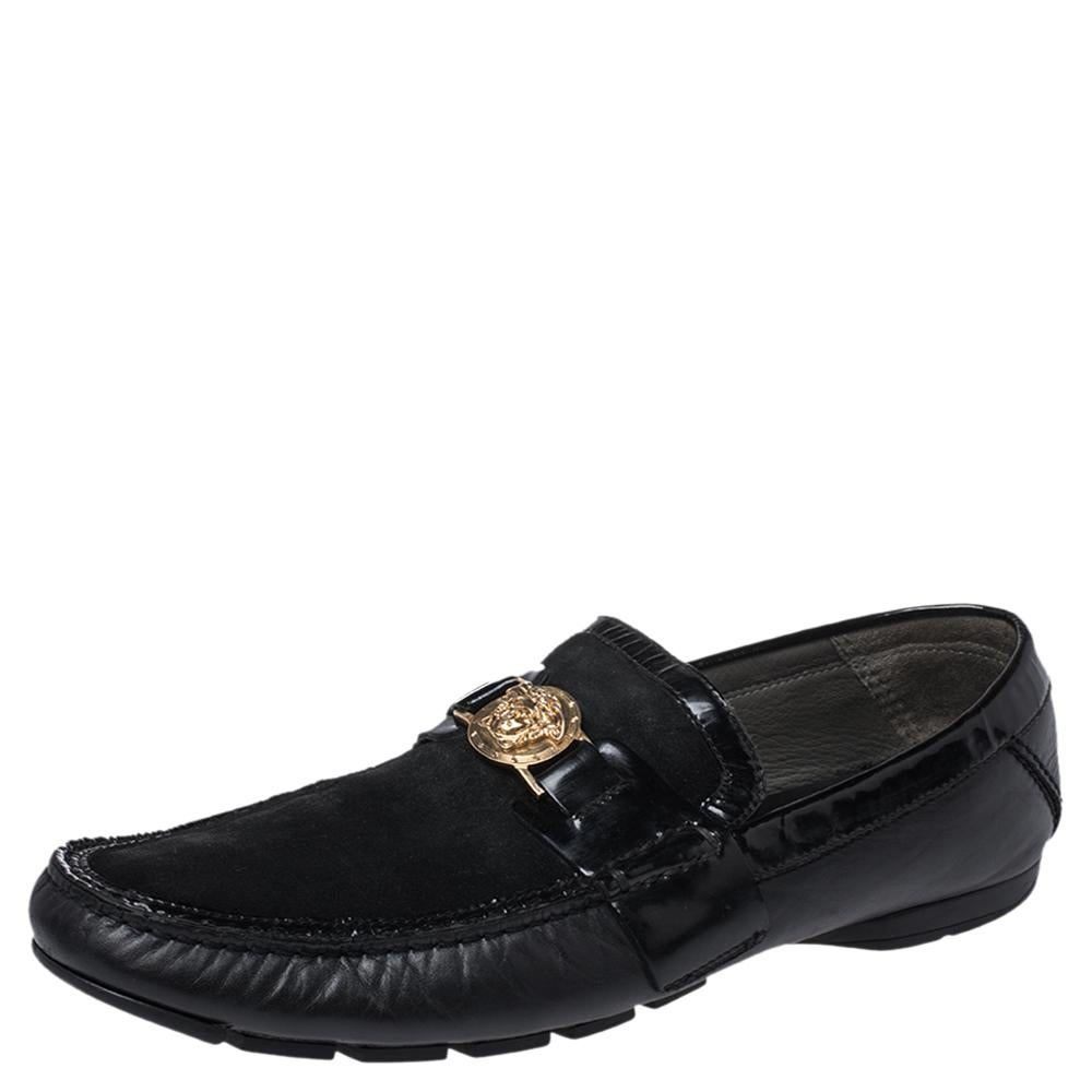Precise stitching, use of quality leather & suede, and a comfortable shape result in this pair of loafers. They are by Versace, and this is evidently displayed with the Medusa motif detailing on the uppers. The black loafers are finished with