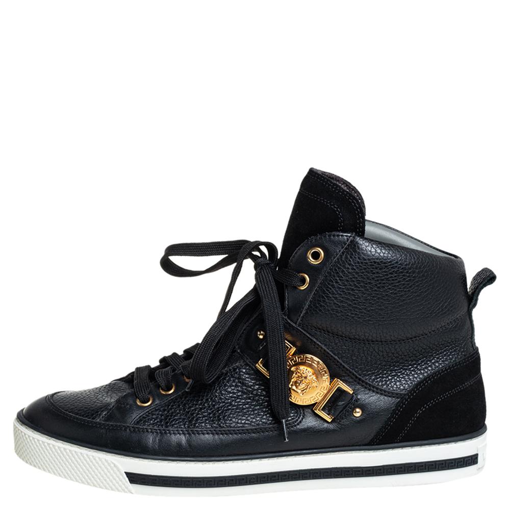 Bring home the luxurious high-fashion touch with these high-top sneakers from Versace. Crafted from black leather and suede, these sneakers come flaunting lace-ups on the vamps, exaggerated tongues, and the iconic Medusa logo detailed on the sides.

