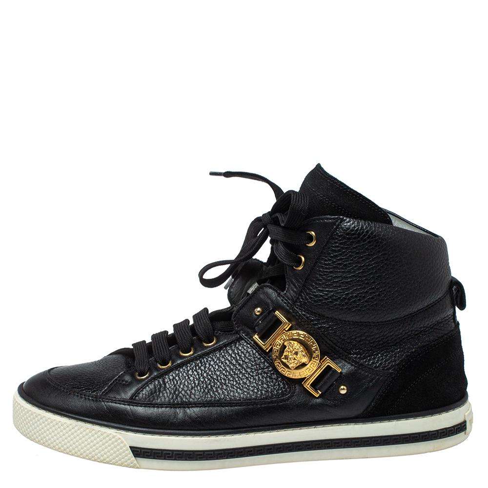 Bring home the luxurious high-fashion touch with these high-top sneakers from Versace. Crafted from black leather and suede, these sneakers come flaunting lace-ups on the vamps, exaggerated tongues, and the iconic Medusa logo detailed straps on the