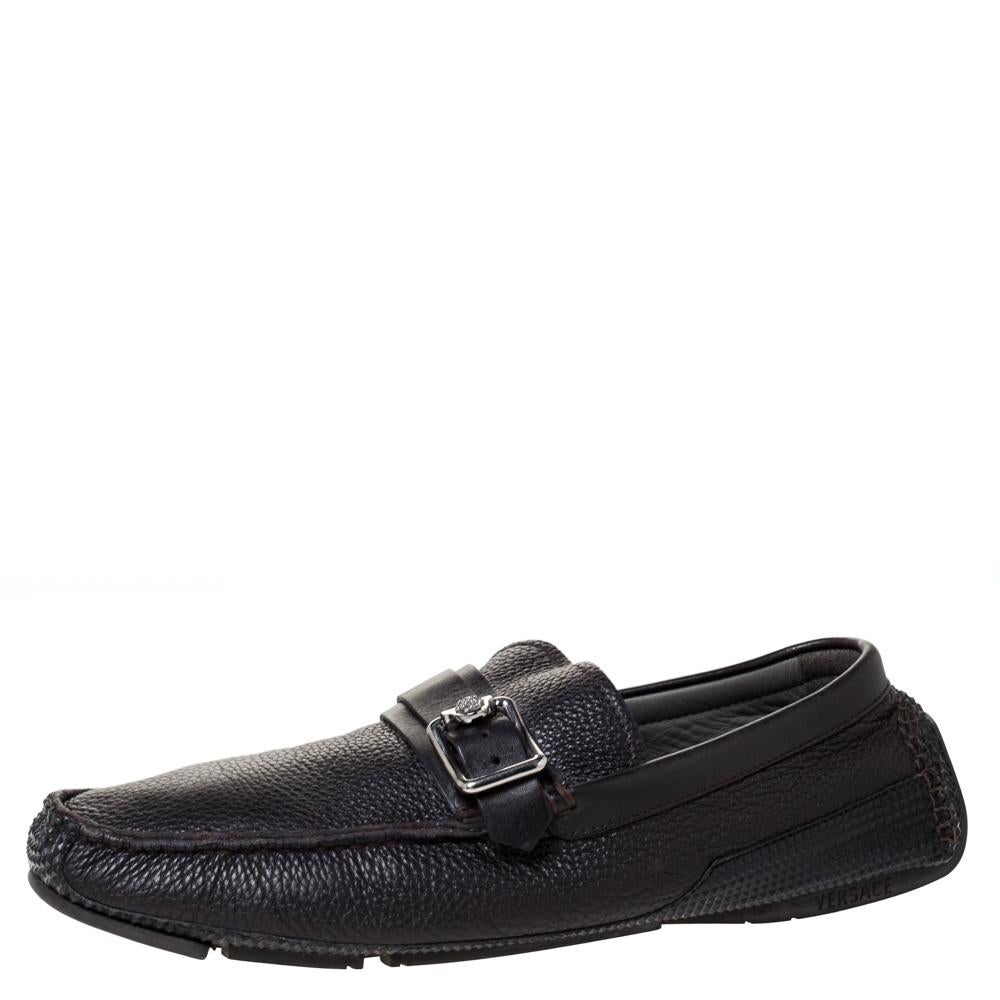 Precise stitching, use of quality leather, and a smart shape led to the final result of this pair of loafers. They are by Versace, and this is evidently displayed with the Medusa Icon motif on the buckle that adorns the vamps. The loafers are