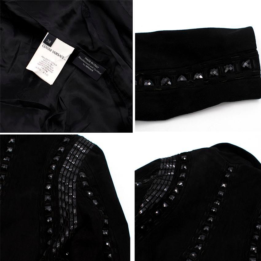 Versace black leather embellished jacket. 
Made in Italy. 

Features black embellished beads, collar, long sleeves, front button fastening and two front pockets. 

Fabric: 100% Leather. Lining: 96% Rayon, 4% Elastane. 

Please note, these items are