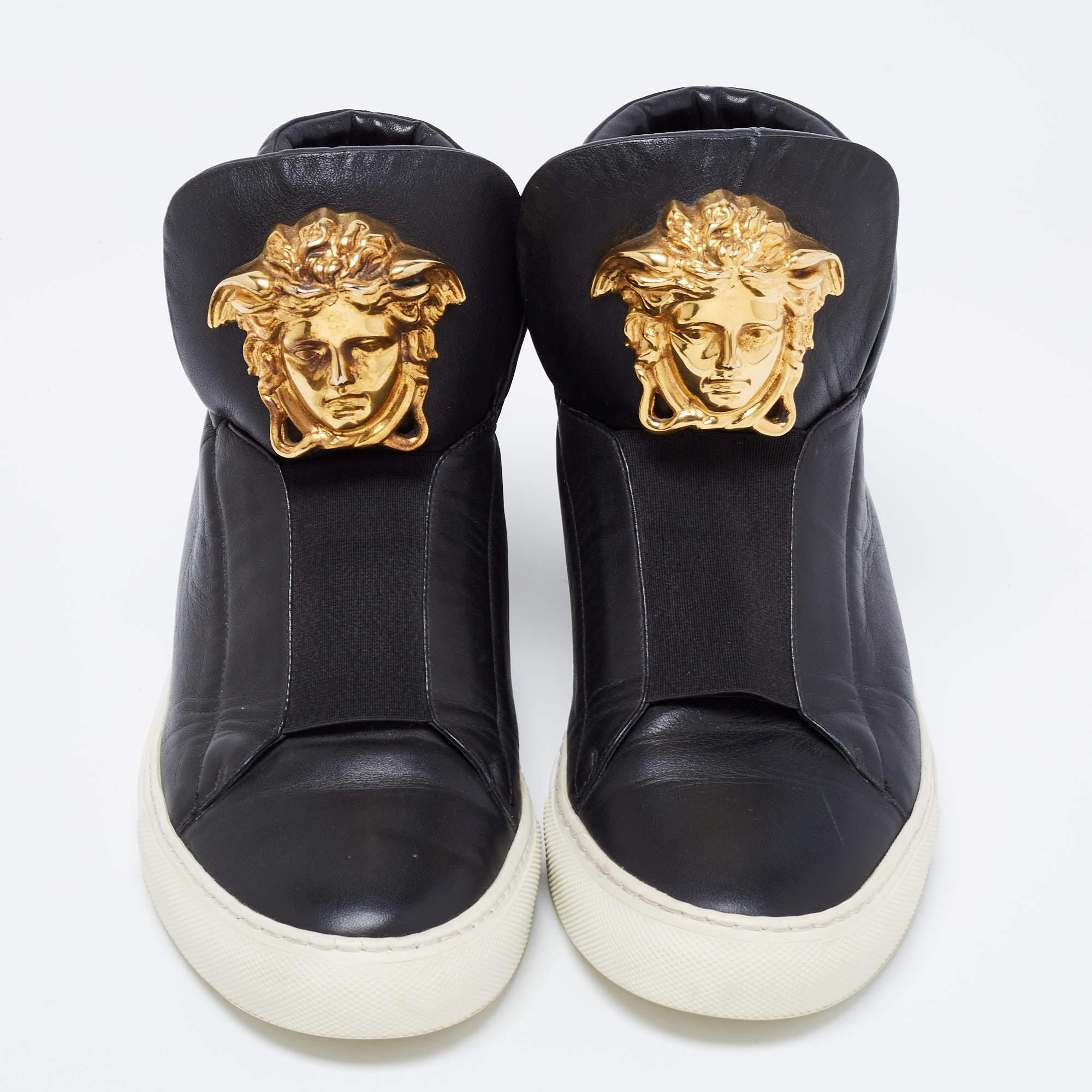 Sneakers are sought-after for reasons like comfort, ease, and casual style. These Versace ones fit right in as they are stylish and snug. They come crafted from black leather into a design of elastic panels and the Medusa logo on the front.

