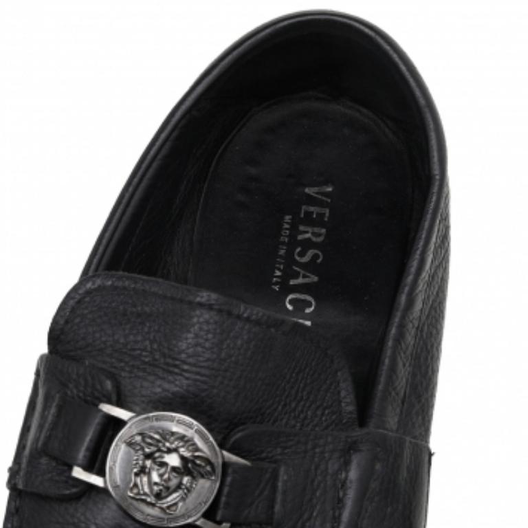 Precise stitching, use of quality leather, and a calculated shape led to the final result of this pair of loafers. The shoes are by Versace, and this is evidently displayed with the Medusa detail on the uppers. The loafers are wrapped in comfort and