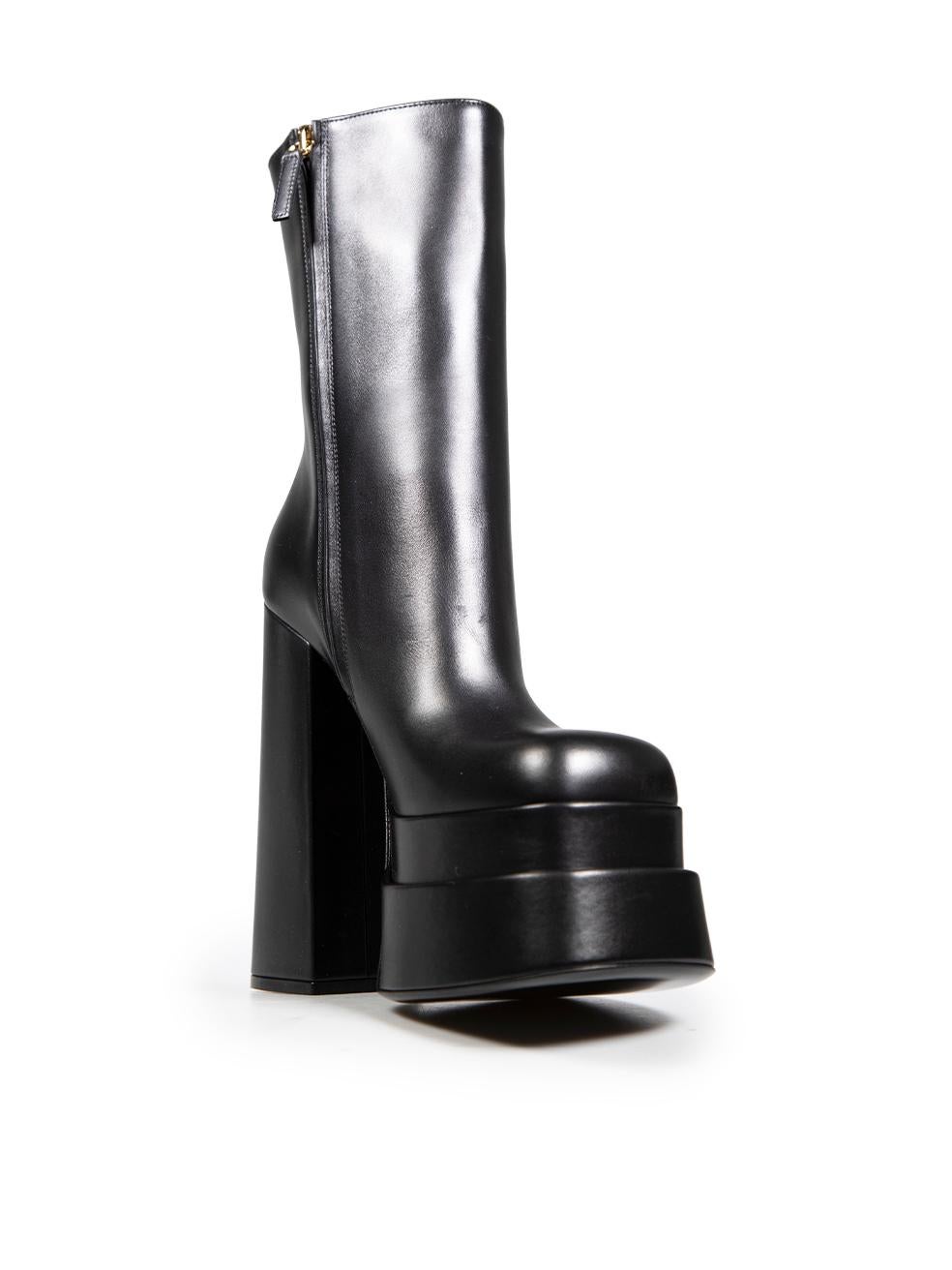 CONDITION is New with tags. Due to poor storage, minimal wear is seen to both boots with minor abrasions seen on the platform mid soles, along the upper front and heel stems on this brand new Versace designer item. The item comes with original dust