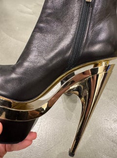 Versace black leather triple platform heels.