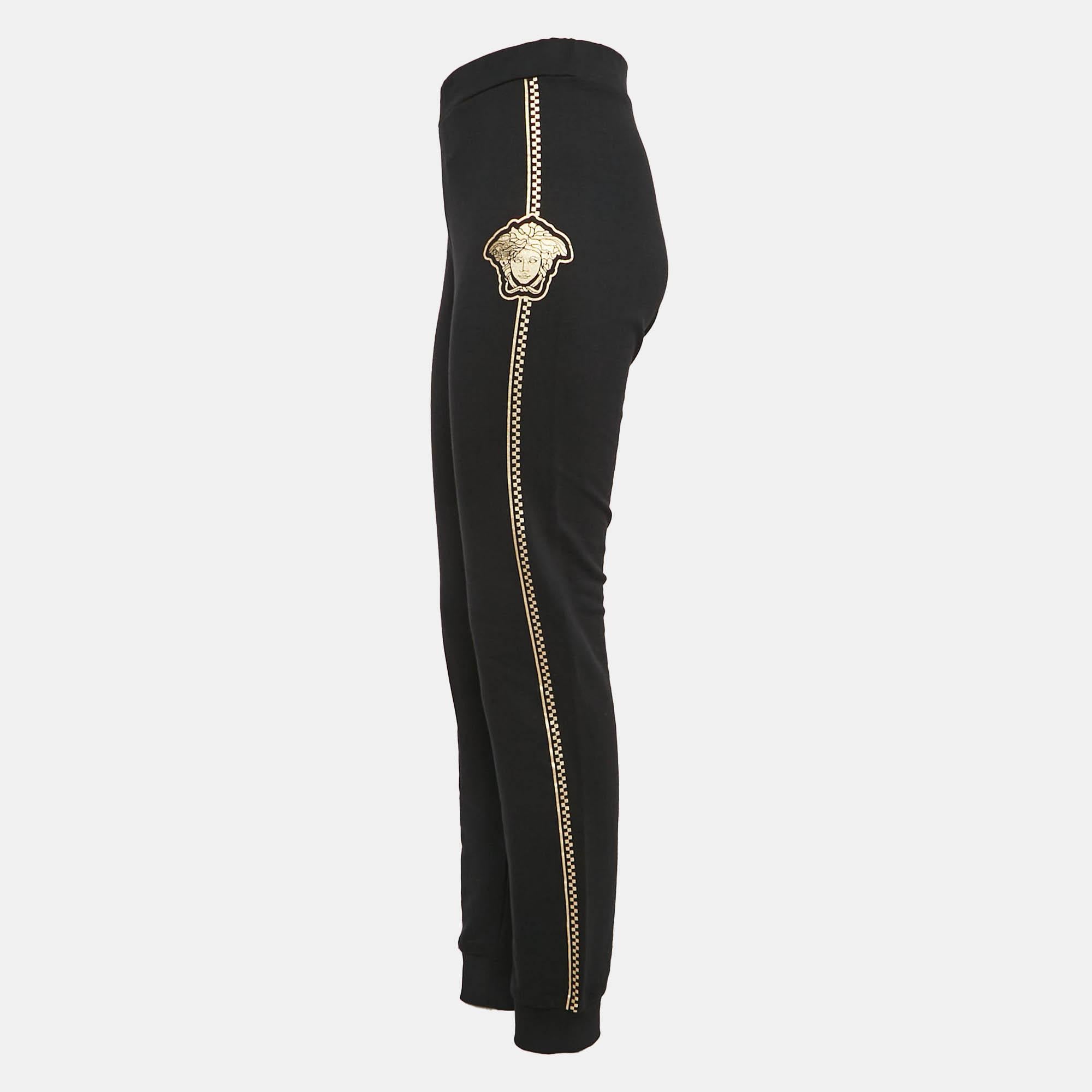 Experience the perfect fusion of style and functionality with these Versace joggers. The choice of materials and design focused on comfort and durability make them suitable for any occasion  whether relaxing or moving.
