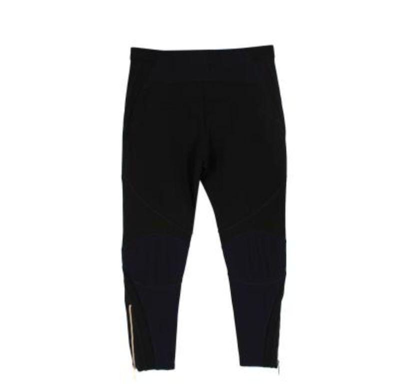 Versace Black Mesh Panelled Tapered Trousers In Good Condition For Sale In London, GB