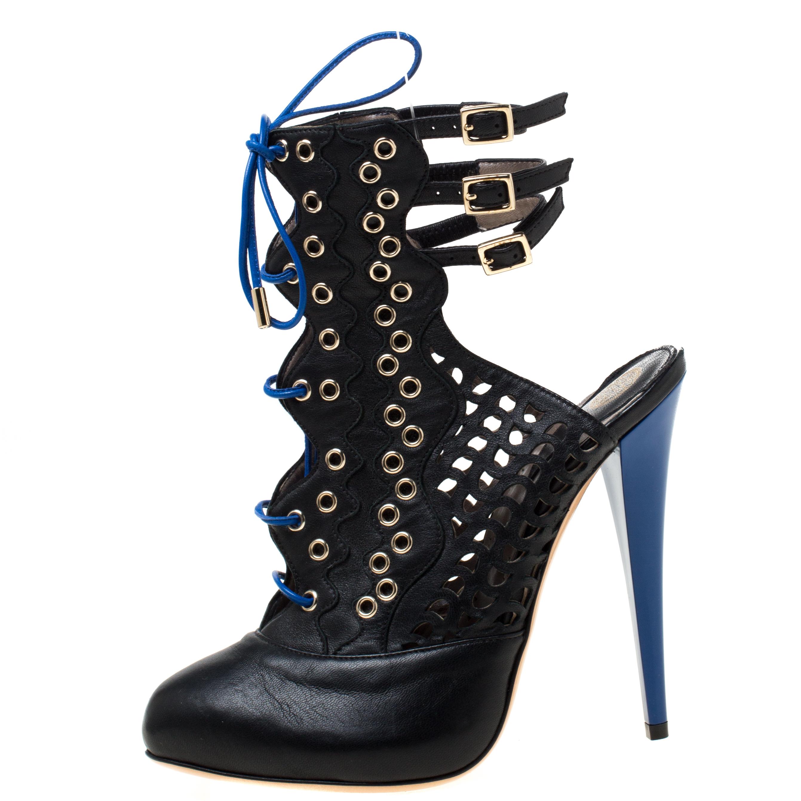 Don't miss out on making these leather booties yours this season. They are by Versace, carefully crafted to exude nothing but high-fashion. The booties feature cutouts, contrast lace-up and heels and three buckle backstraps.

Includes: The Luxury