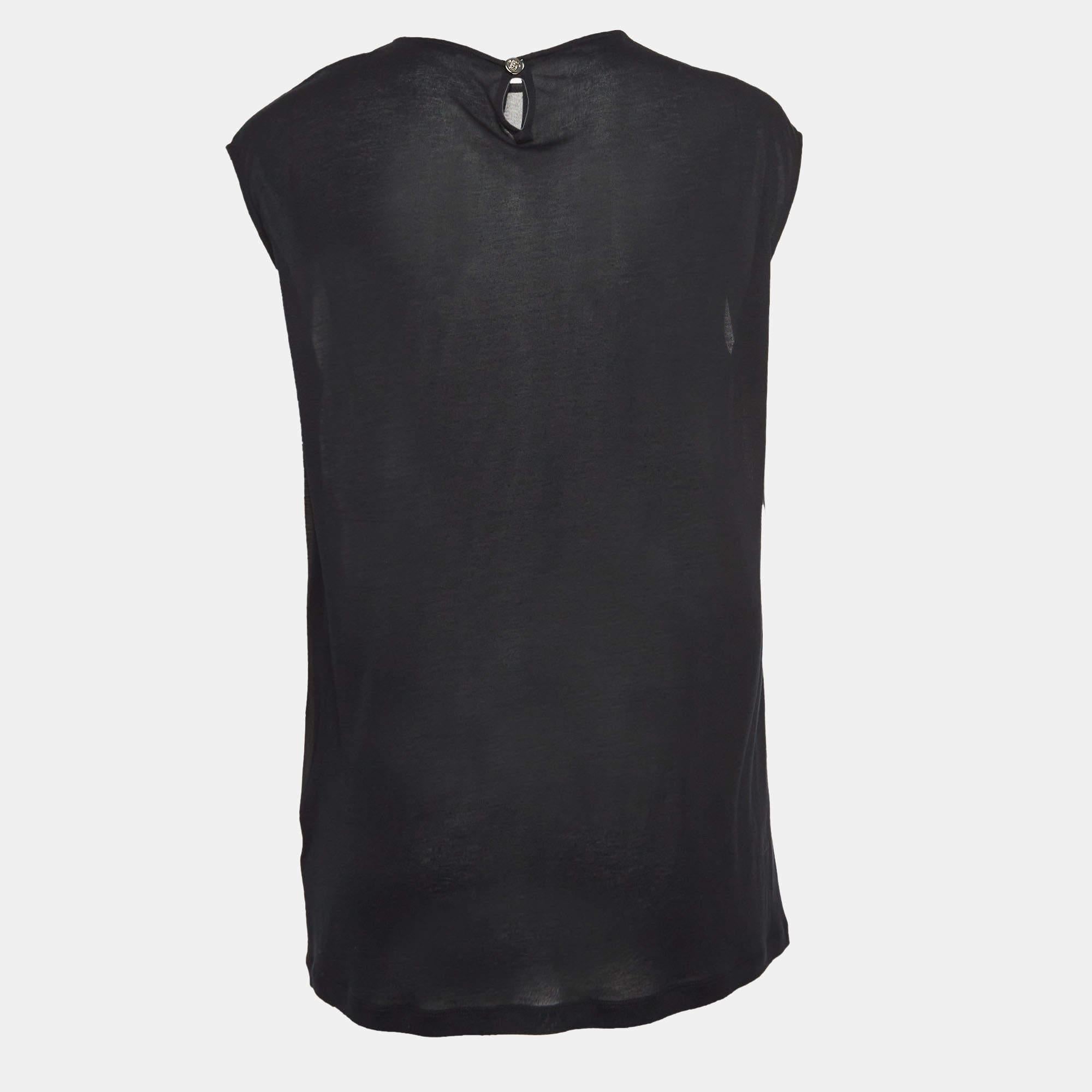Questo top griffato offre stile e comfort. Realizzata con i migliori tessuti, la creazione è stata curata nei minimi dettagli. Abbinalo a una gonna e a dei tacchi.
