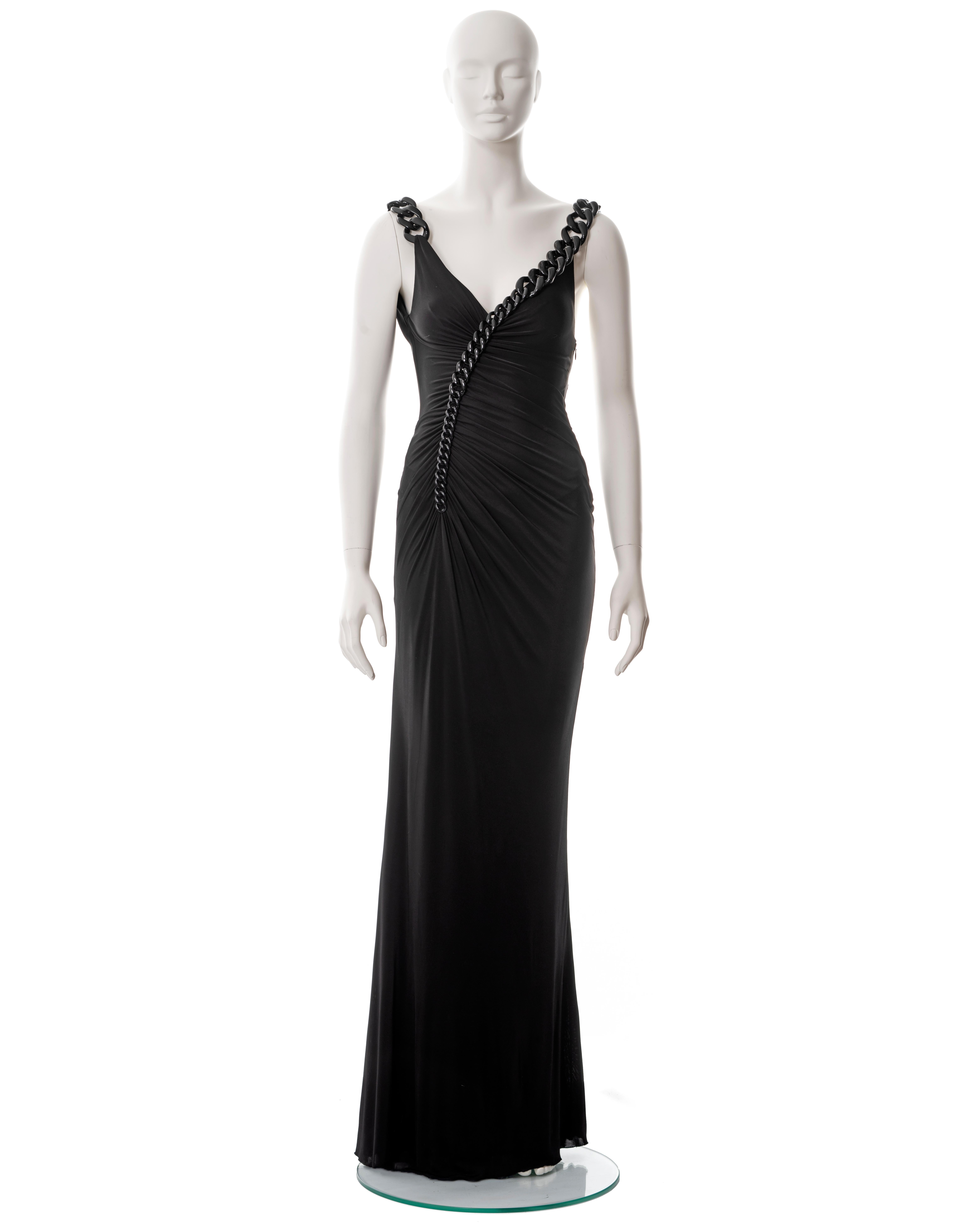 ▪ Versace black evening dress
▪ Sold by One of a Kind Archive
▪ Glossy black acrylic chain shoulder straps 
▪ Ruched bodice 
▪ Floor-length skirt 
▪ Built-in bodysuit
▪ IT 38 - FR 34 - UK 6
▪ Made in Italy

All photographs in this listing EXCLUDING