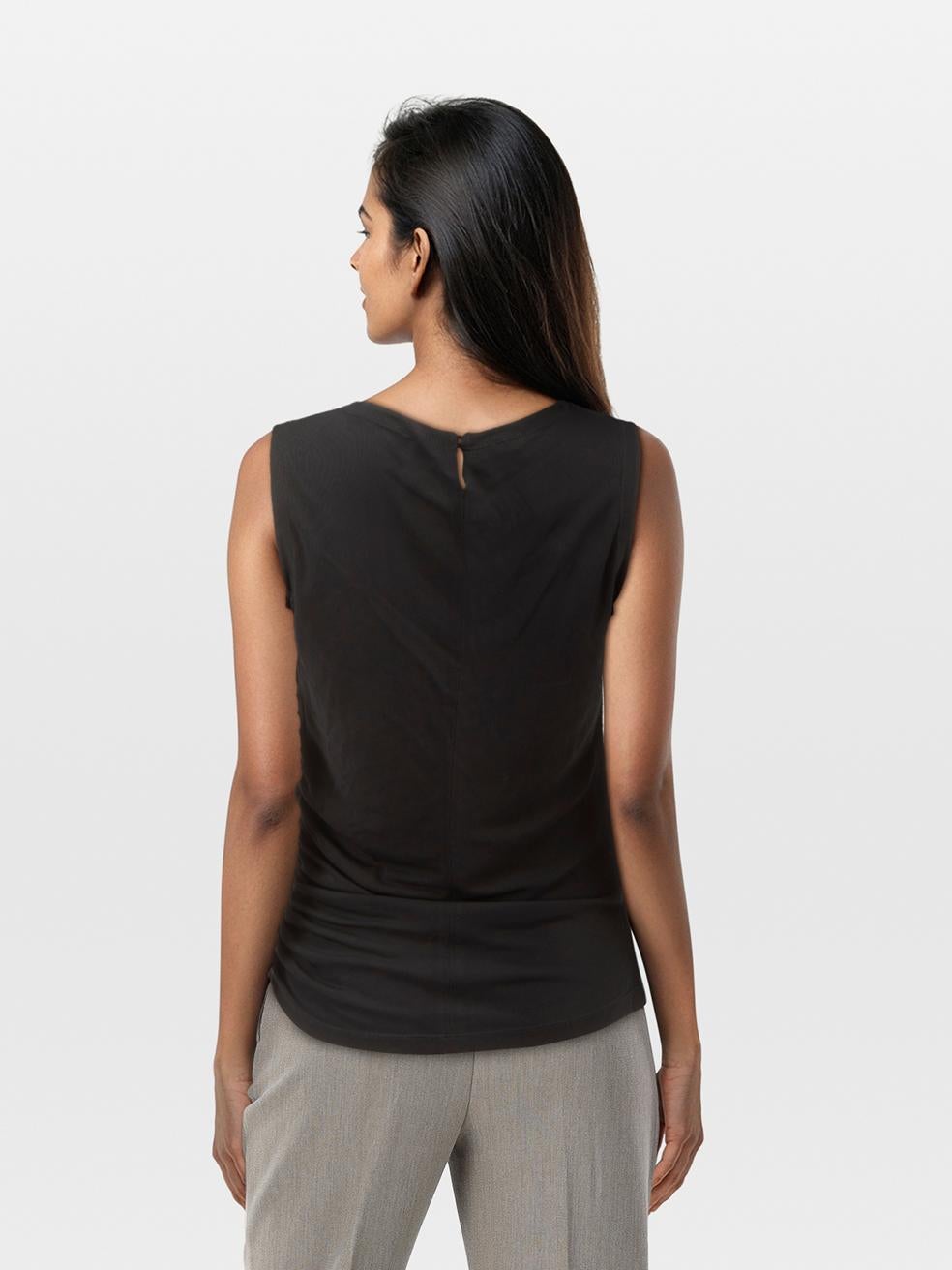 CONDITION is Very good. Minimal wear to top is evident. Minimal wear to the front where some light discolouration can be seen on this used Versace designer resale item.
 
 Details
 
 
 Black
 
 Synthetic
 
 Top
 
 Sleeveless
 
 Sheer
 
 Ruched