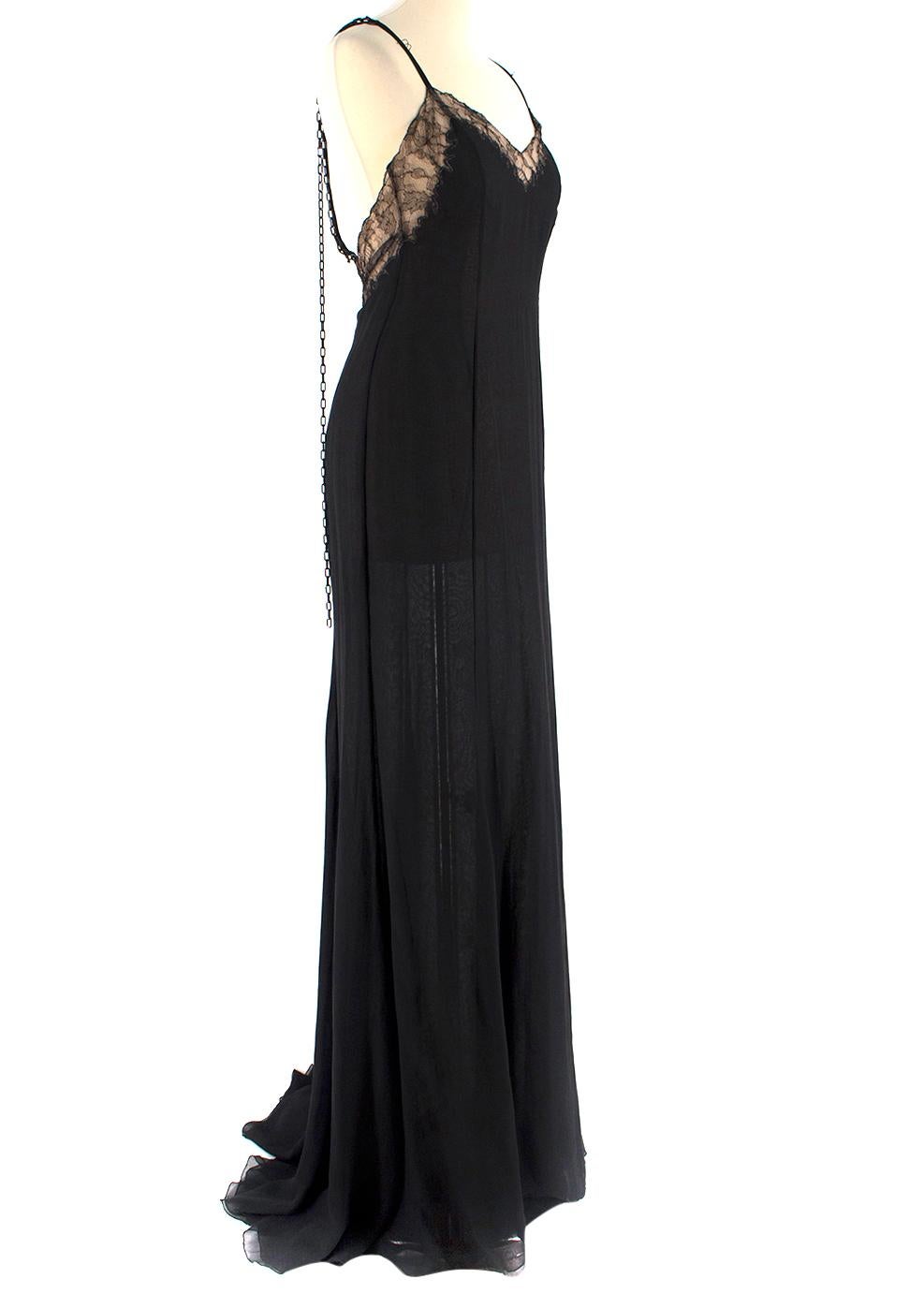 Versace Black Silk Gown Slip Dress with Chain Details

- Slip gown silk dress
- Embellished with beige lace to the trim 
- V neckline 
- Open back
- Spaghetti straps embellished with chain details
- Sheer
- Unlined
- Hidden zip fastening to the side