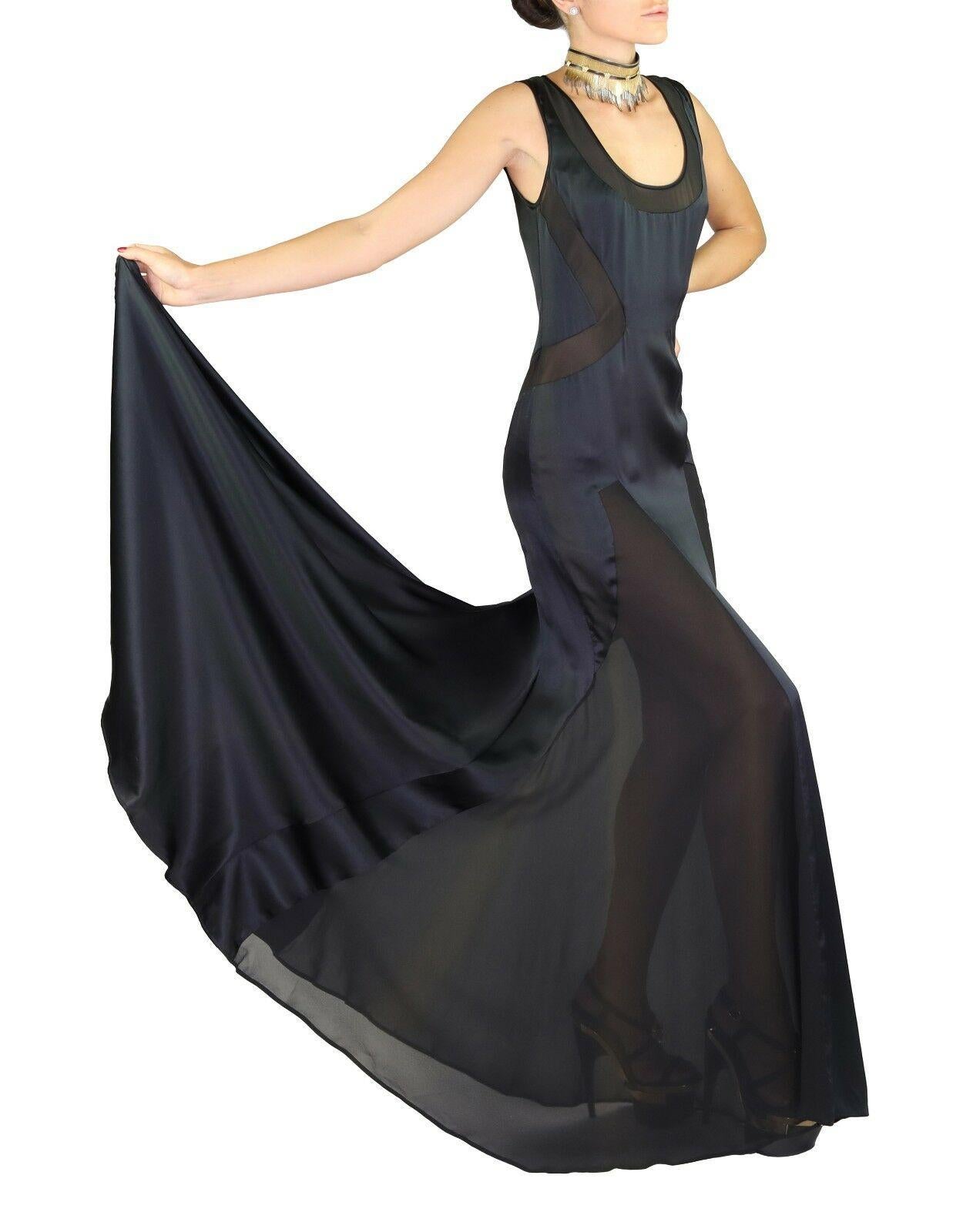 VERSACE

Black Silk gown with Transparent inserts

Train at the back

Content: 100% Silk

Size 40 or US 4

Armpit to armpit: up to 18