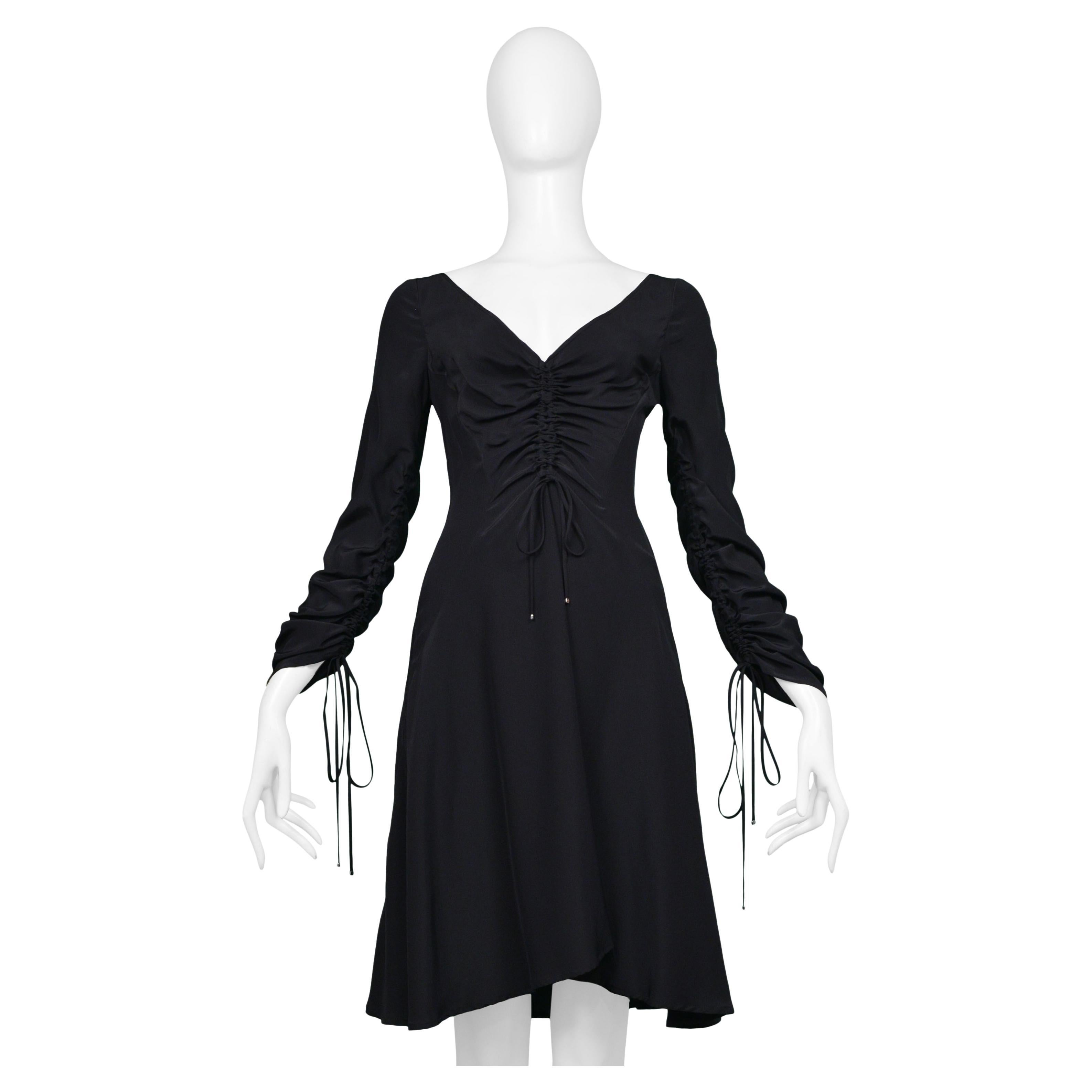 Versace, mini-robe noire avec cordons de serrage et décolleté plongeant, années 2000 en vente