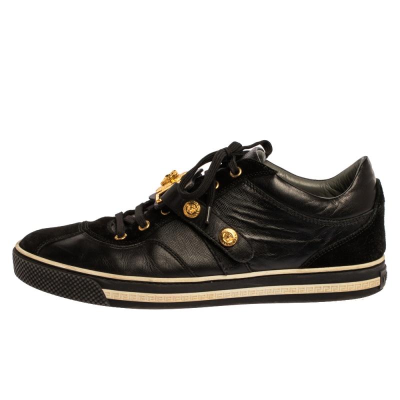 These sneakers are ideal to lend a dramatic twist to your outfits. Crafted from suede and leather, this stylish pair by Versace is a mark of luxury. They feature the signature Medusa motif in gold-tone on the lace-up vamp along with leather insoles,