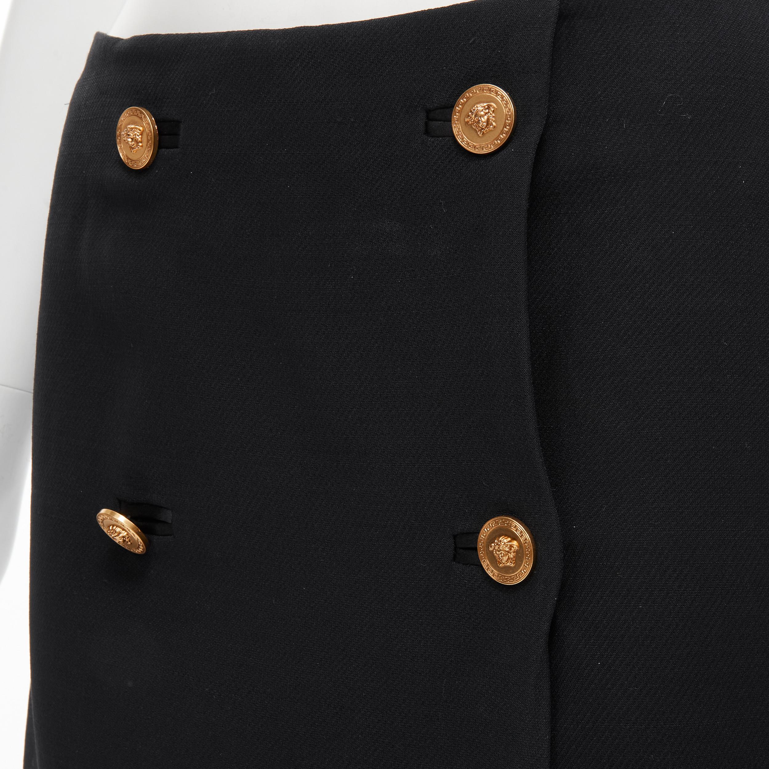 VERSACE black wool crepe gold Medusa button double breasted mini skirt IT38 XS Reference: TGAS/B01719 
Brand: Versace 
Designer: Donatella Versace 
Material: Wool 
Color: Black 
Pattern: Solid 
Closure: Button 
Made in: Italy 

CONDITION:
