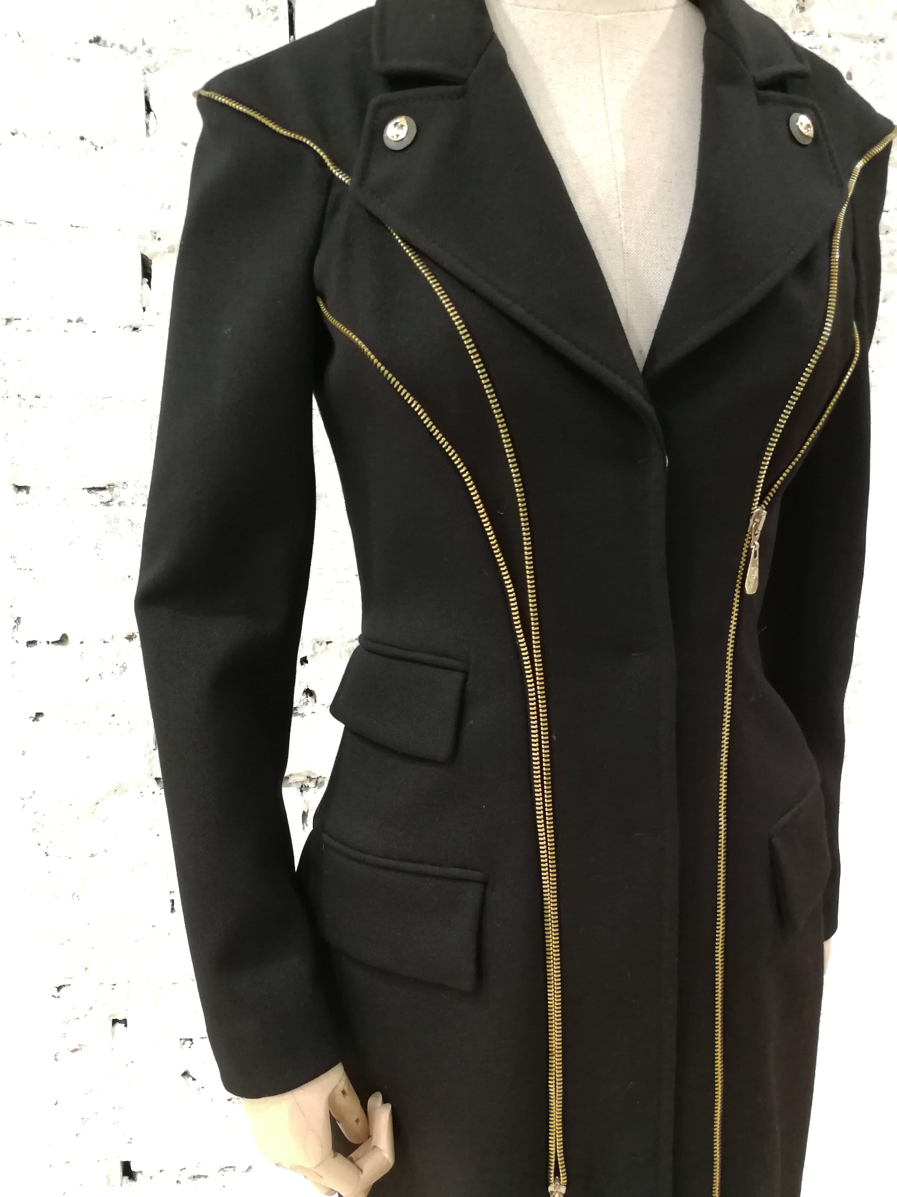 black coat with gold zippers
