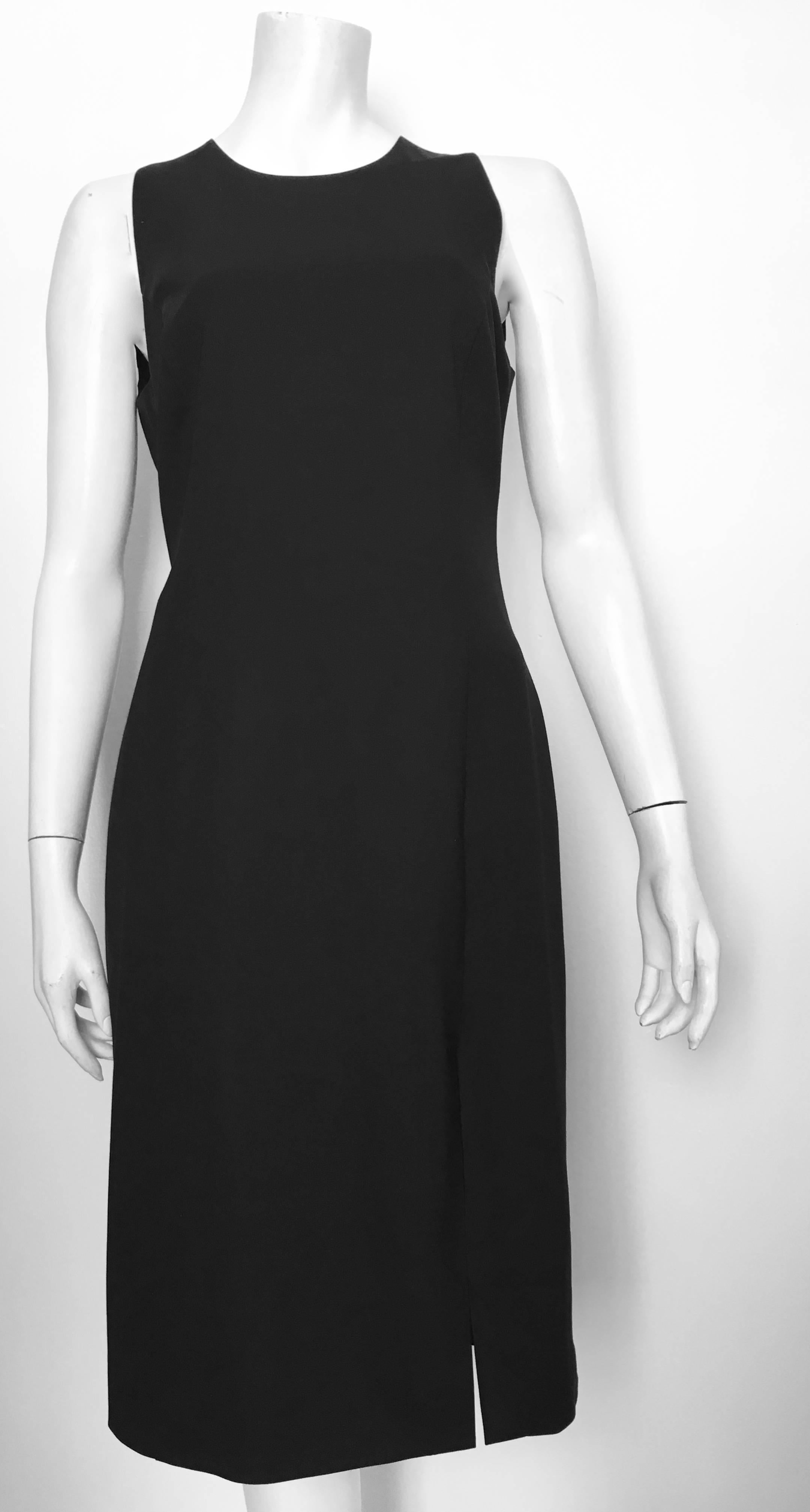Versace Black Wool Sleeveless Sheath Dress Size 8. In Excellent Condition For Sale In Atlanta, GA