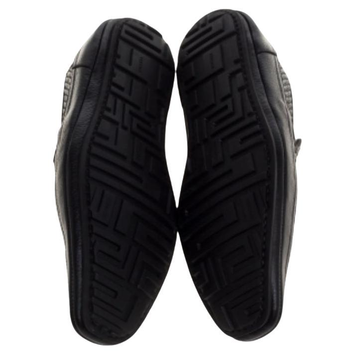 Exquisite and well-crafted, these Versace loafers are worth owning. They have been crafted from woven leather and they come flaunting a black shade with logo plaque on the uppers. The loafers are ideal to wear all day.